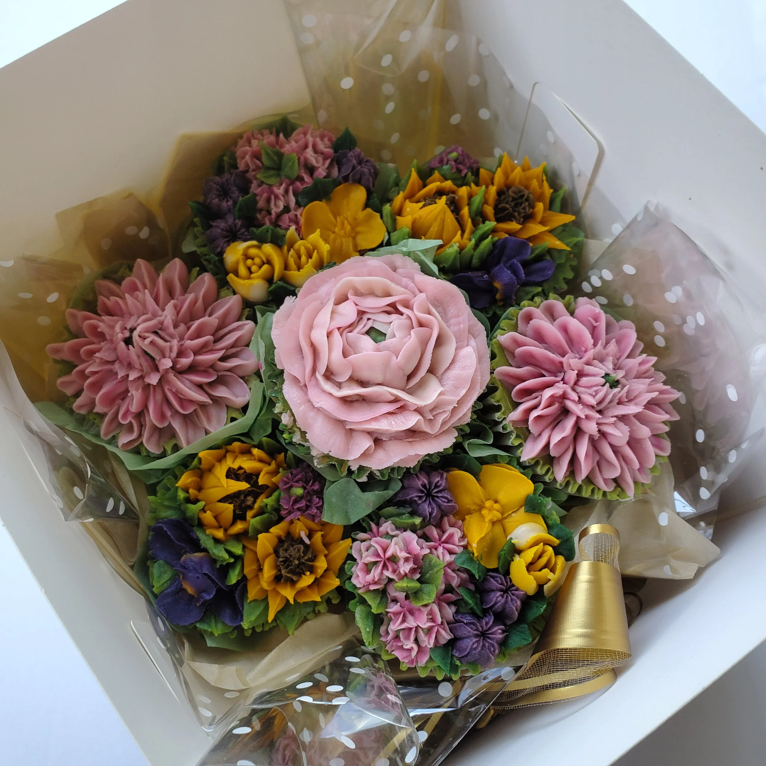peony, sunflower, and wildflower cupcake bouquet
