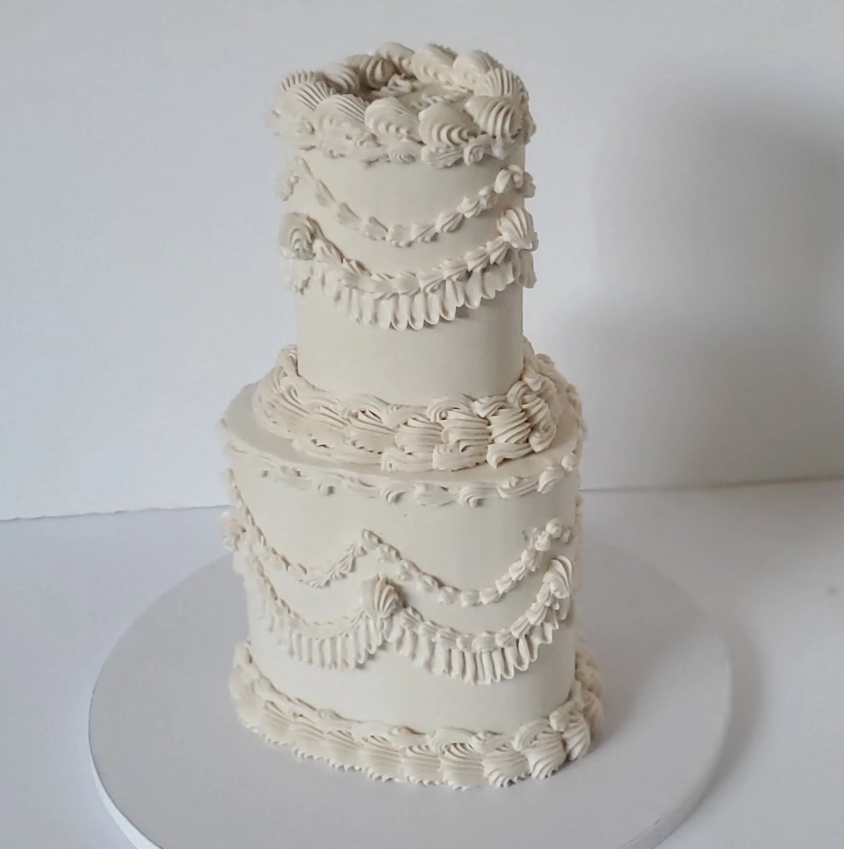 white heart vintage wedding cake