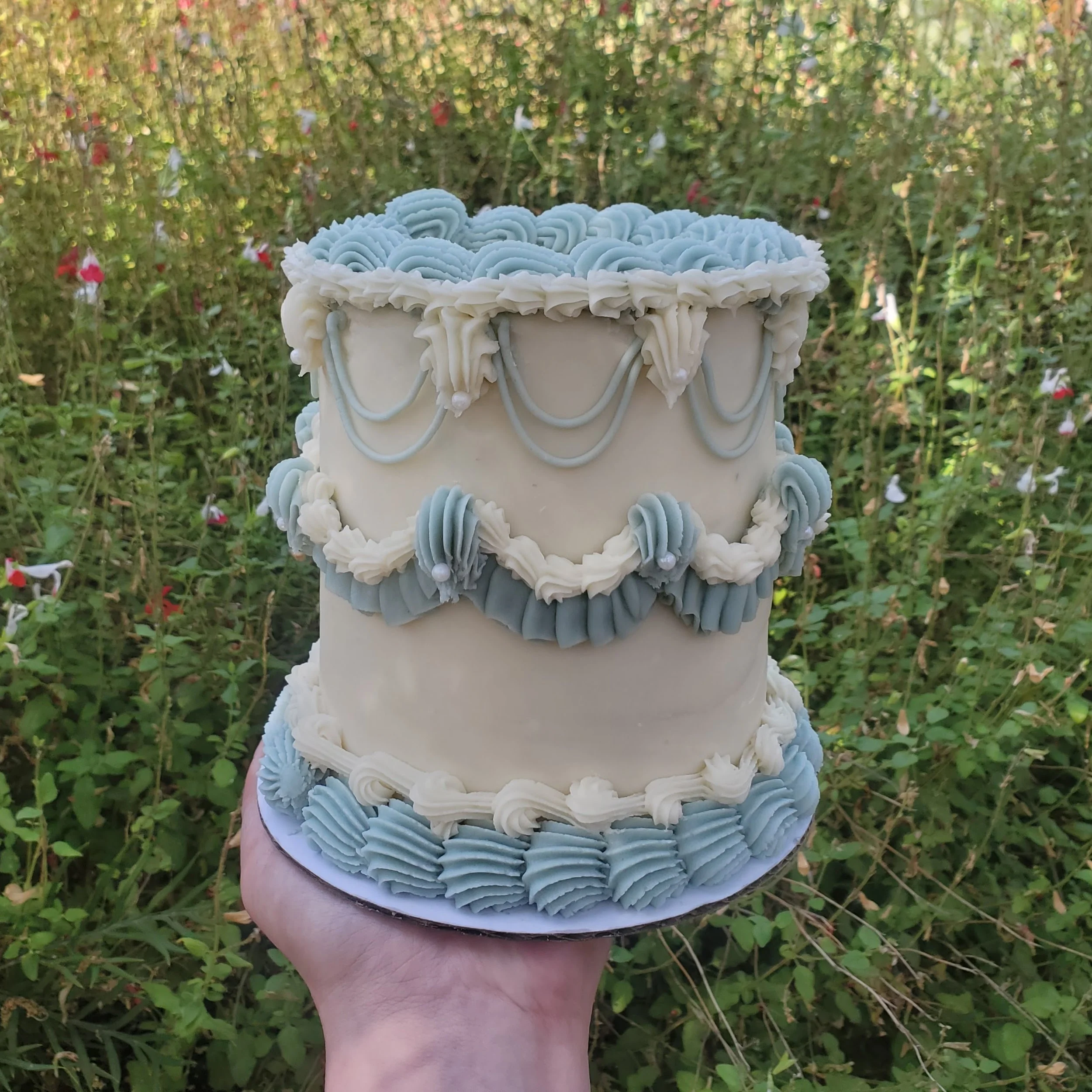 light blue and white vintage cake