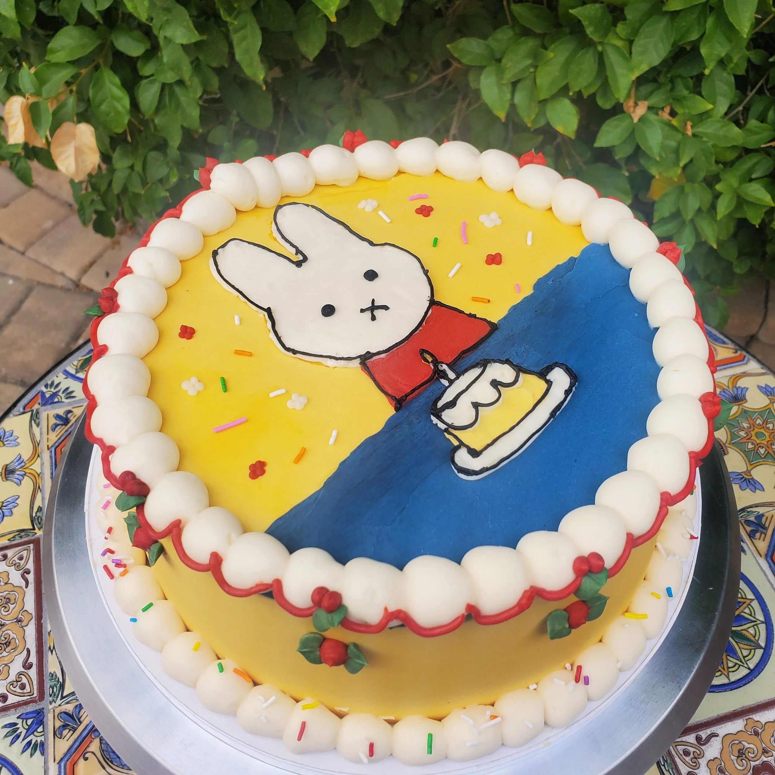 vintage style birthday cake with miffy character