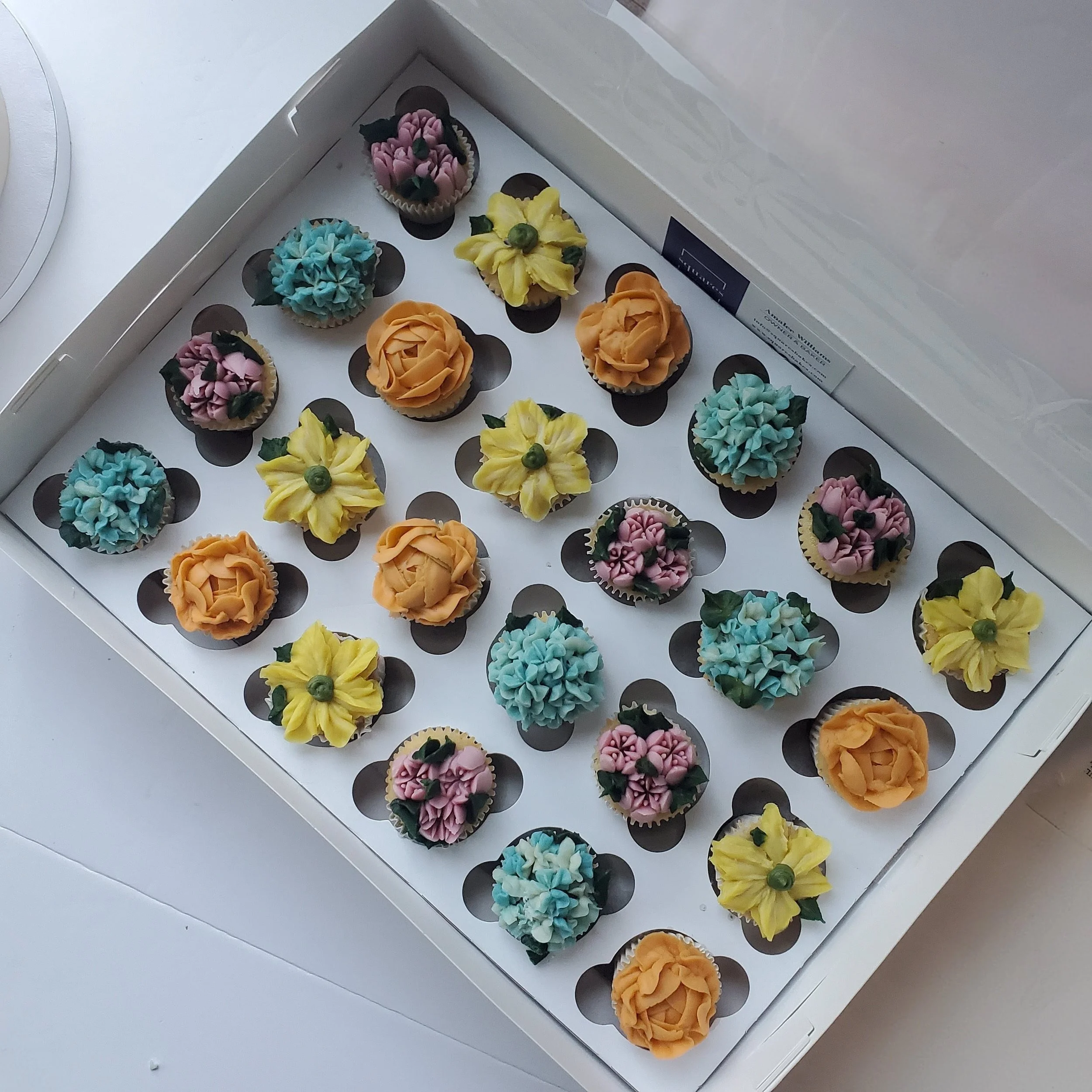 pastel mini cupcakes with hydrangeas and peonies
