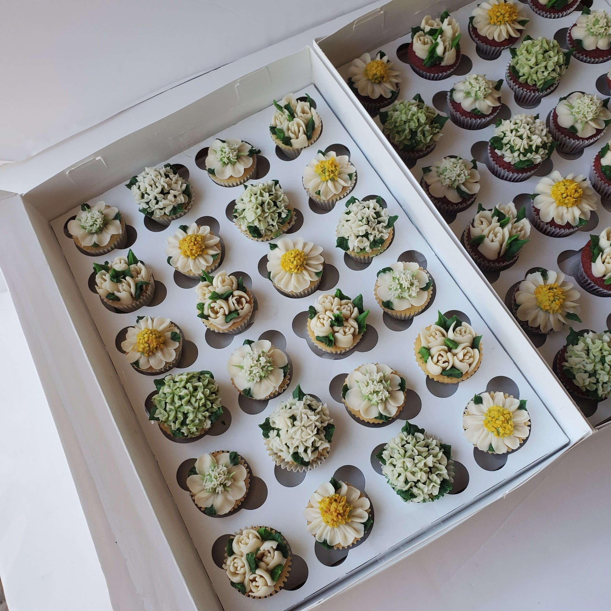 mini white and green floral cupcakes
