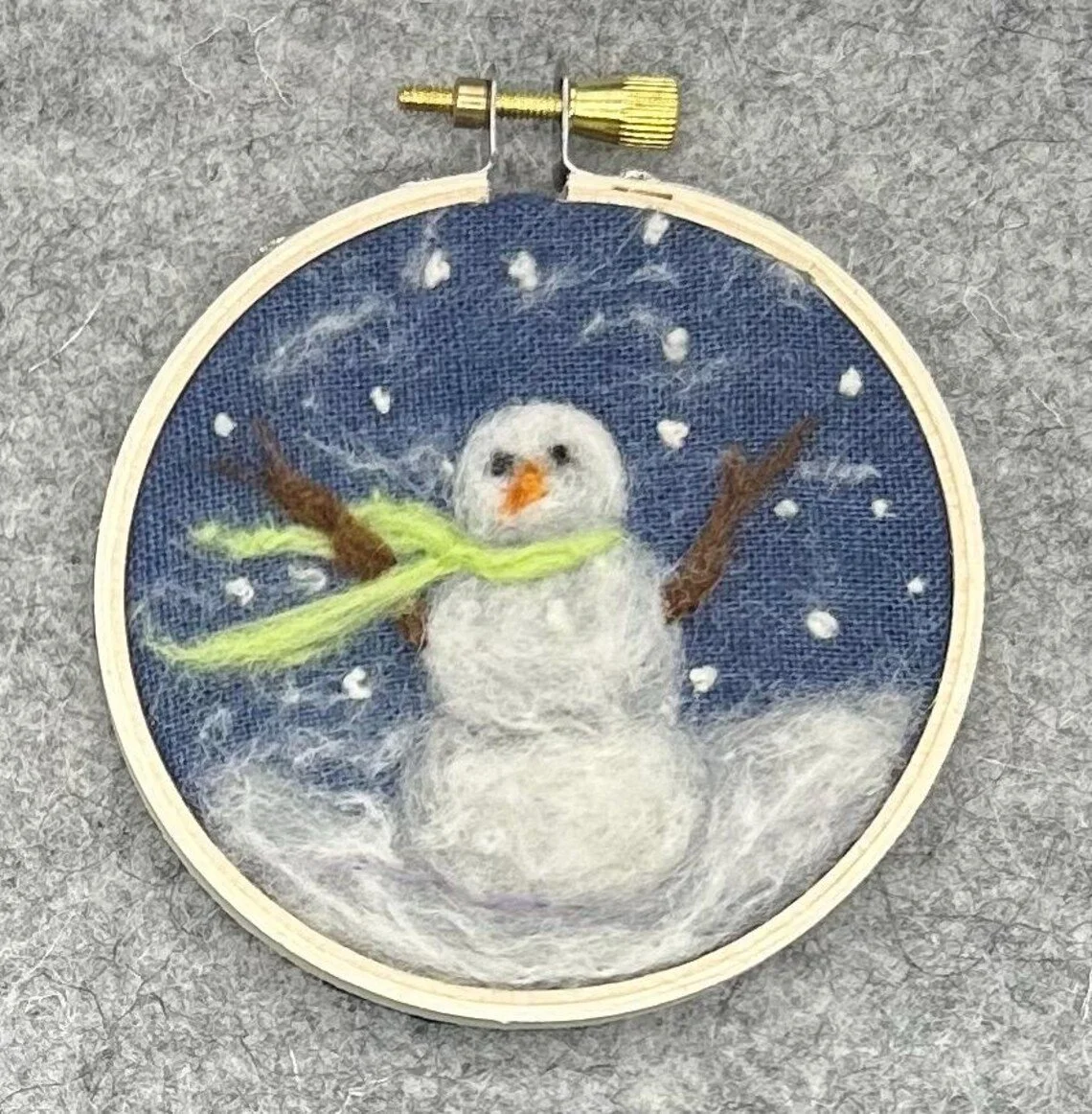 $35 - Needle Felted Snowman framed in 3 inch hoop