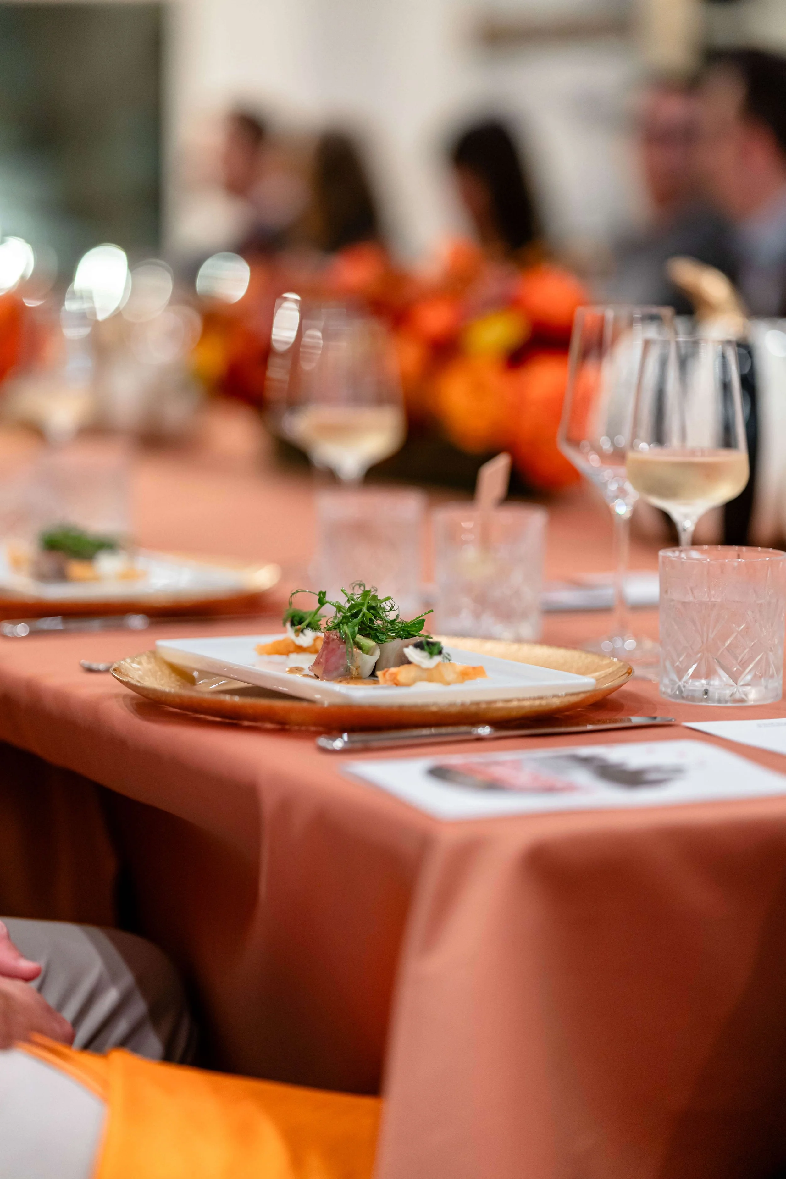 plated dish on fine dining set table for corporate catering experience in chicago