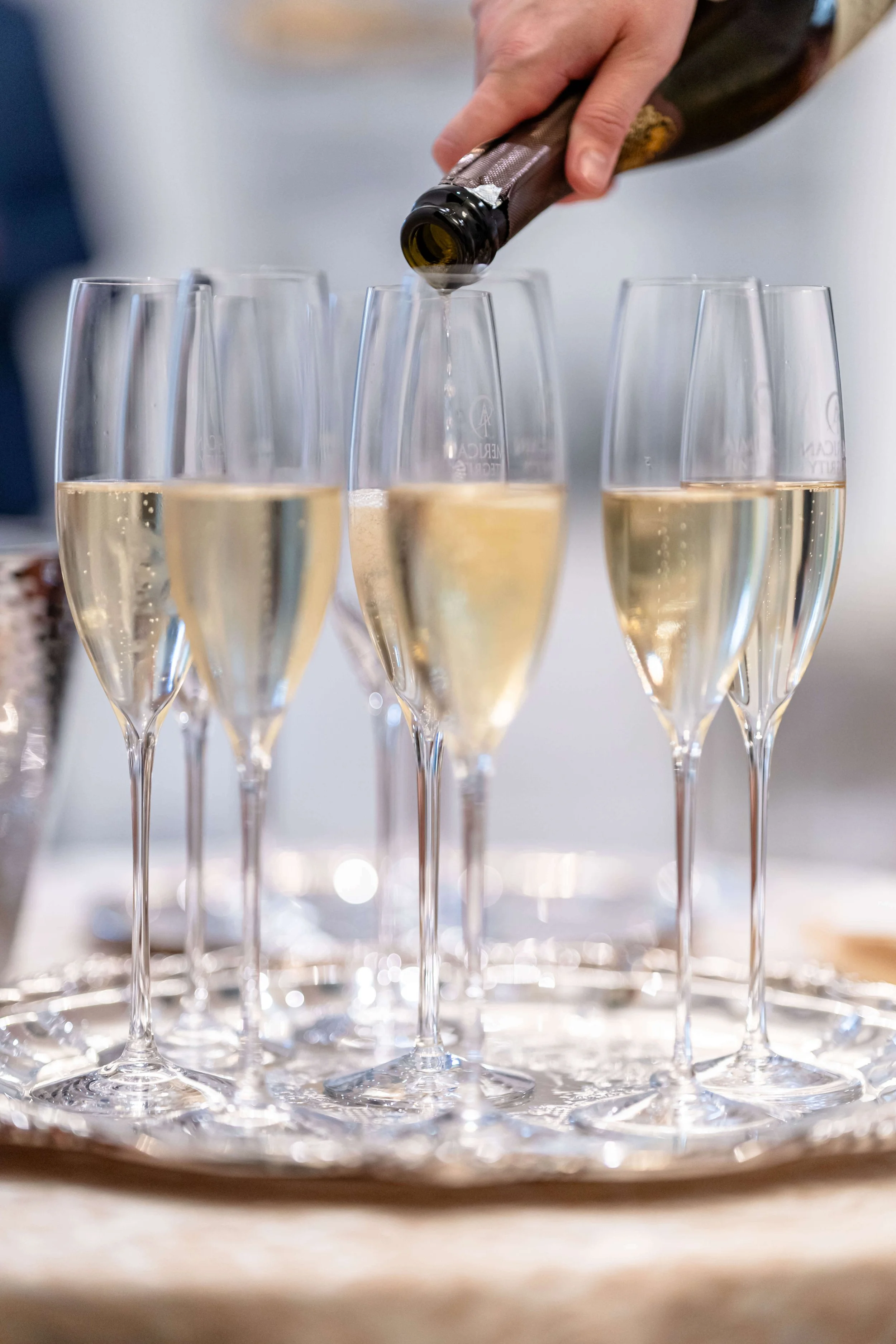 champagne poured for New Year's Eve Catering by Chicago Private Chef