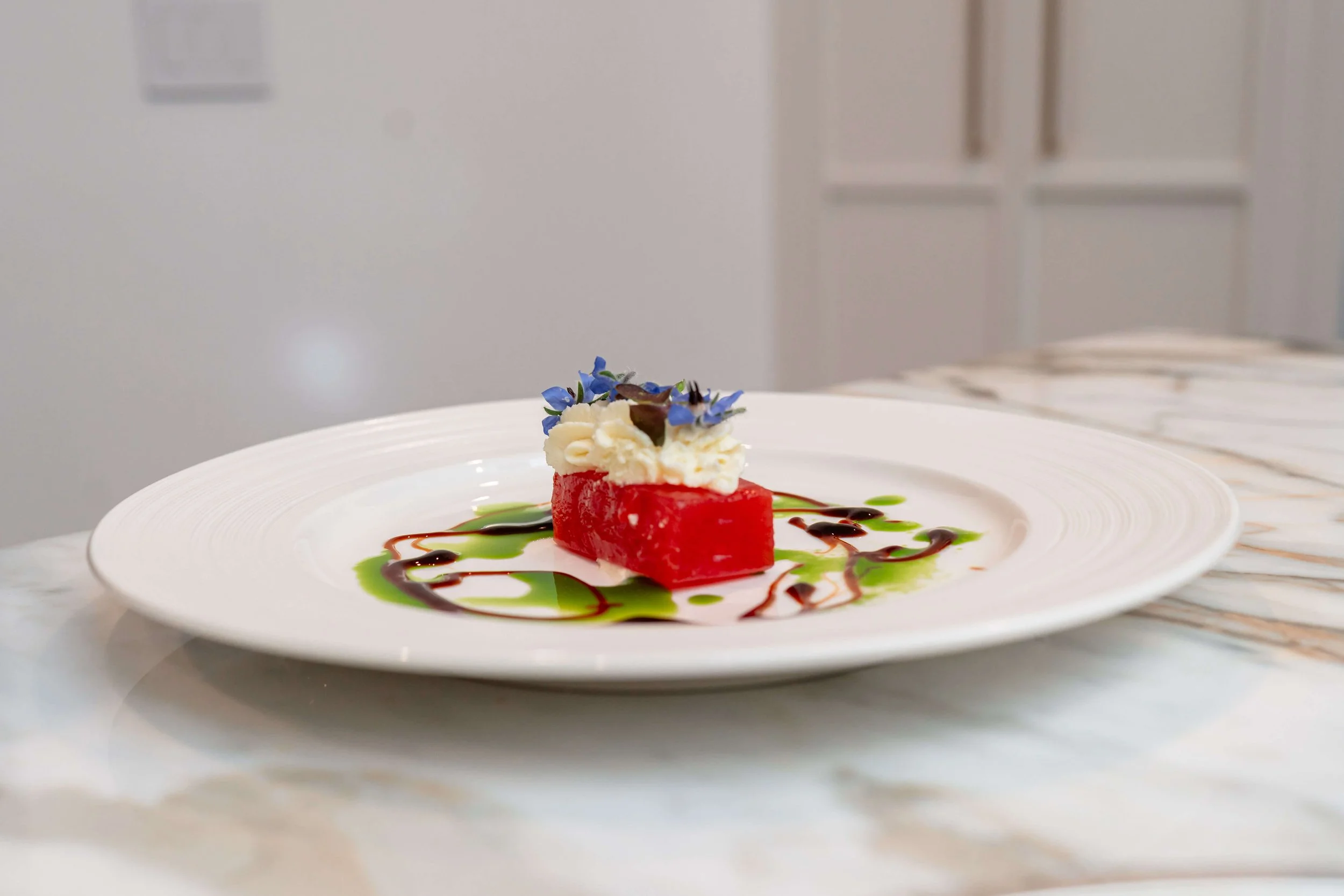 watermelon feta dish plated creatively for dining for two in chicago