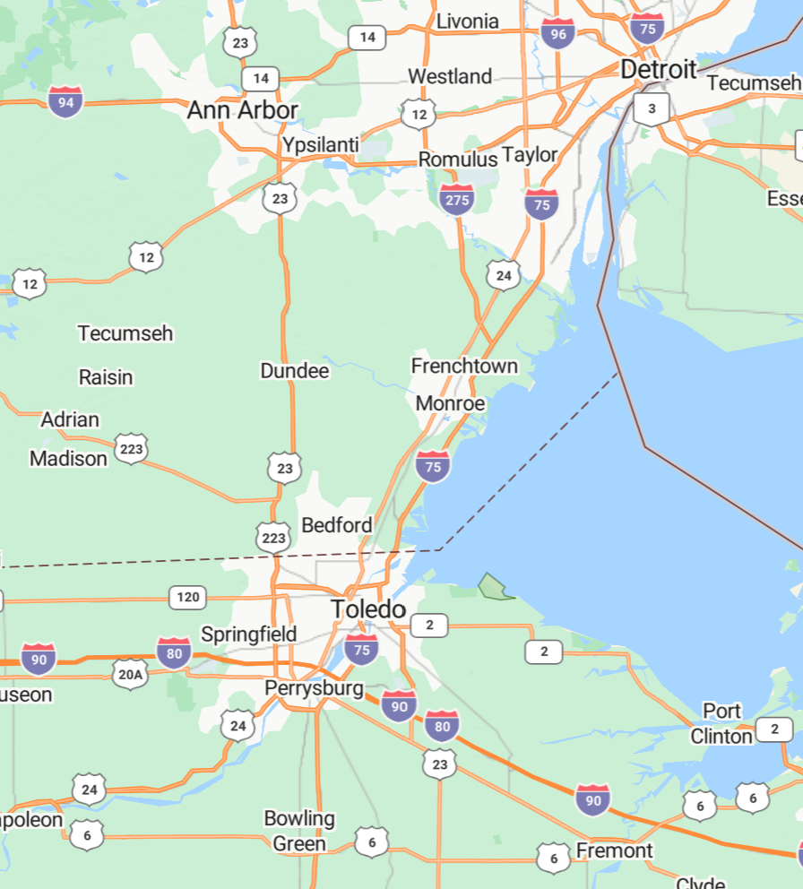 Map of Michigan with cities labeled, including Detroit, Ann Arbor, Ypsilanti, and Toledo, with highways and lakes visible.