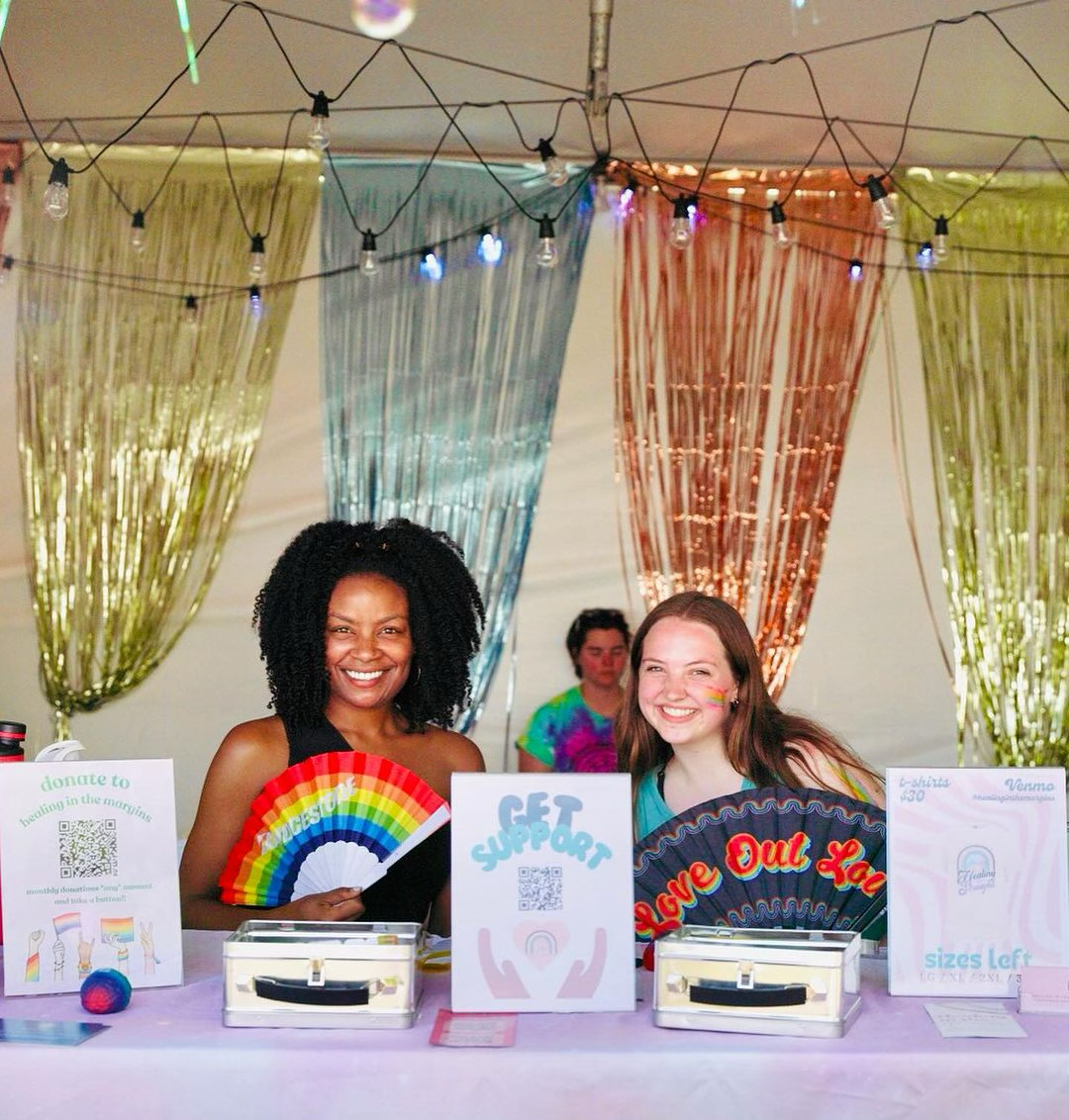 Amelia and Olivia tabling at PRIDE 2024, Photography by Miles Wilson