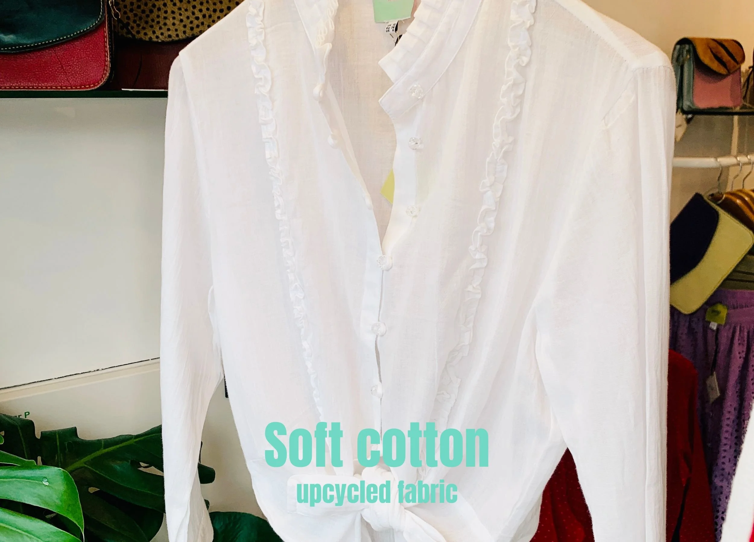 White cotton blouse shirt with ruffles and cropped sleeves perfect for work and holidays designed by Pop London sustainable fashion