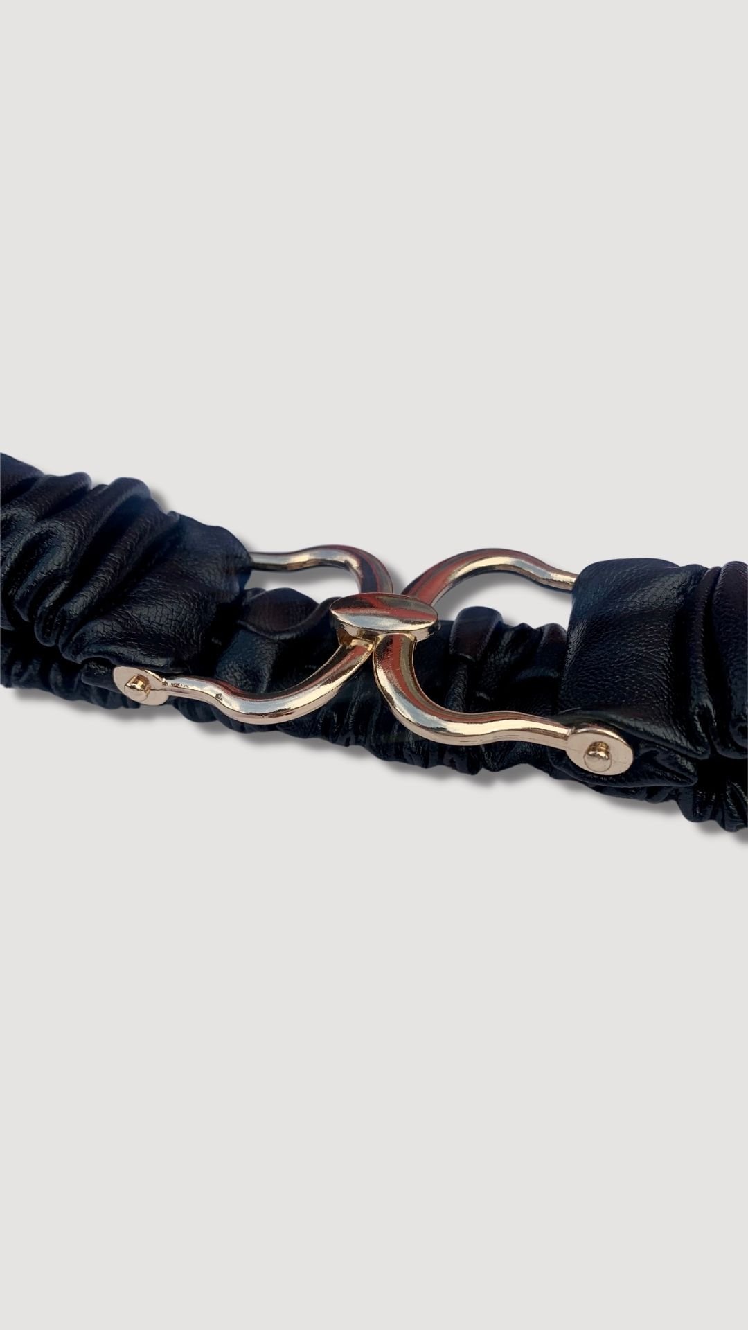 Vegan leather belt with X lock front 2.jpg