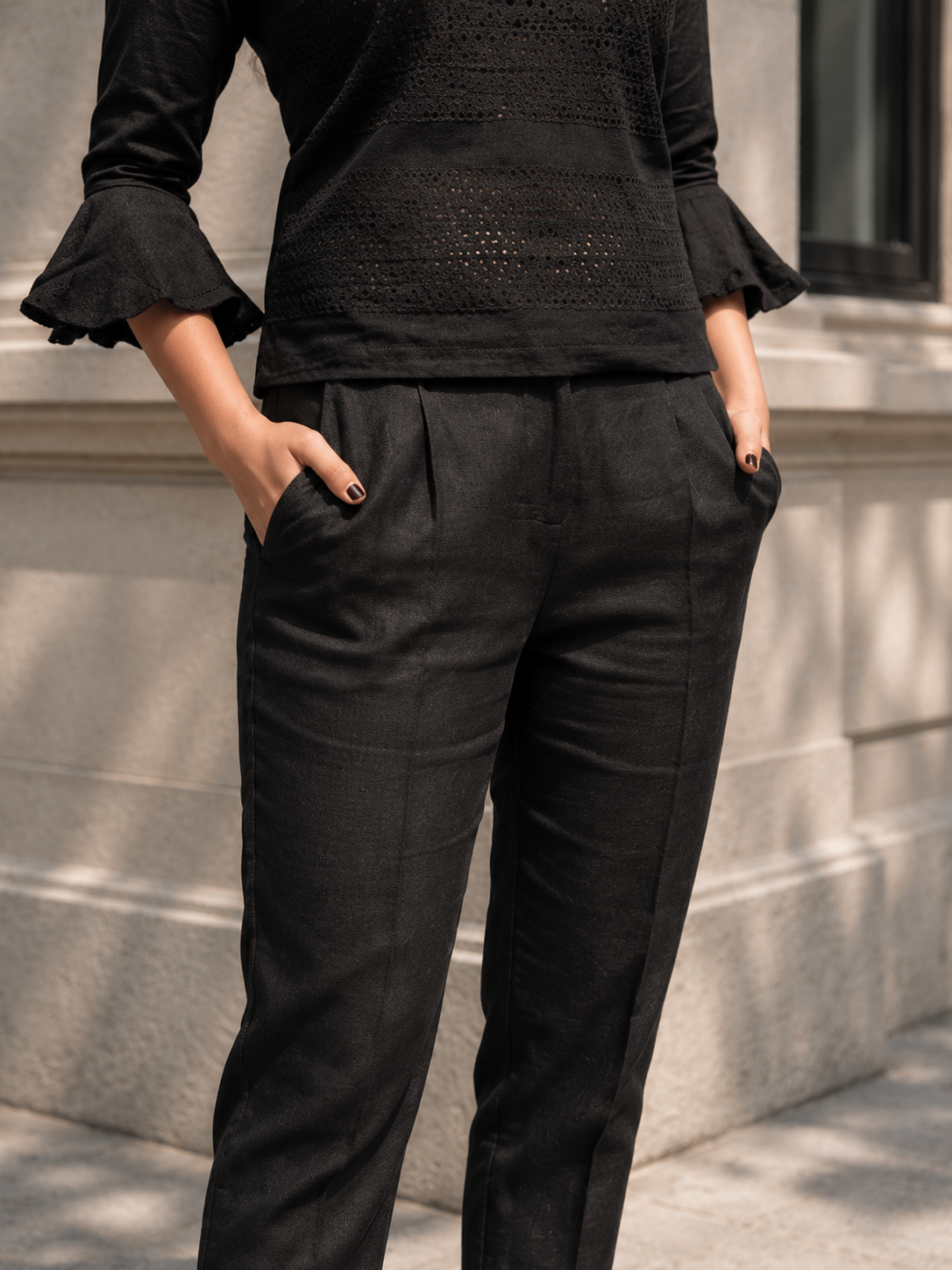 Cropped linen trousers with pockets black close up Pop London Sustainable Fashion Independent British Brand.png