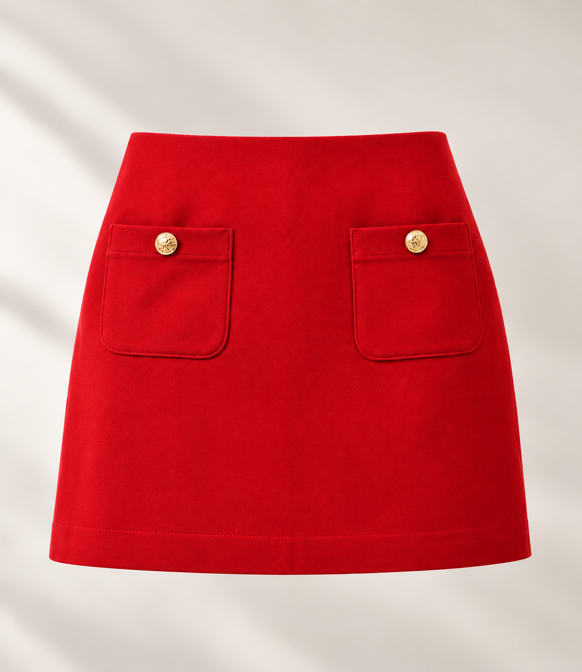 Pop London scarlet red mini skirt with gold buttons and pockets.png