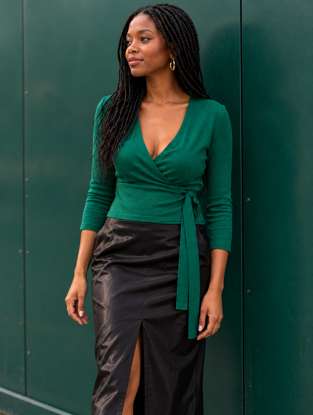 Pop London emerald green wrap cardigan with model.png