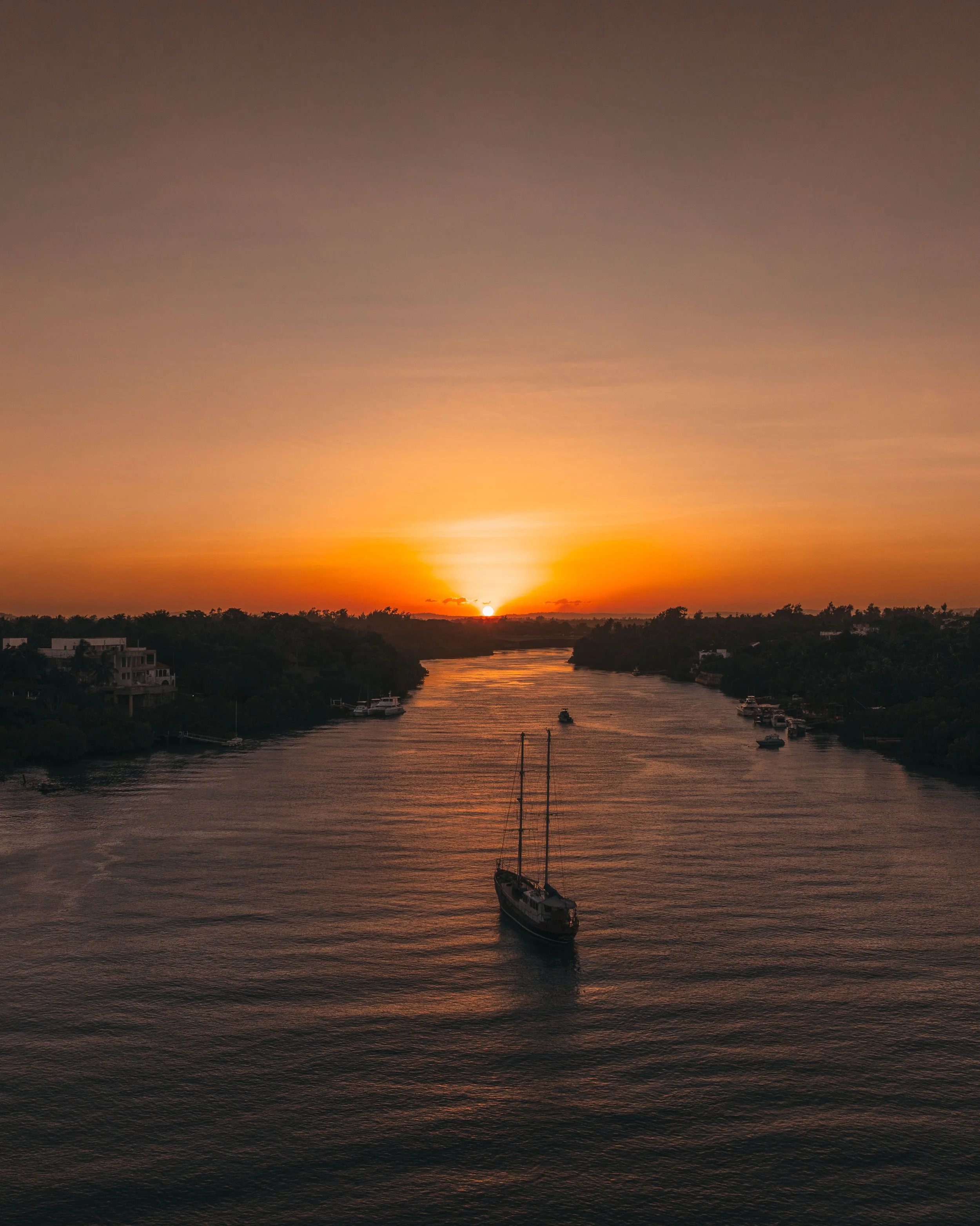 Where the creek meets the Indian Ocean, the last light of day transforms the shores of Shanzu, Mombasa. Here at Fisherman&rsquo;s Creek, traditional dhows and quiet mangroves map the timeless, shifting rhythms of the Kenyan coast.