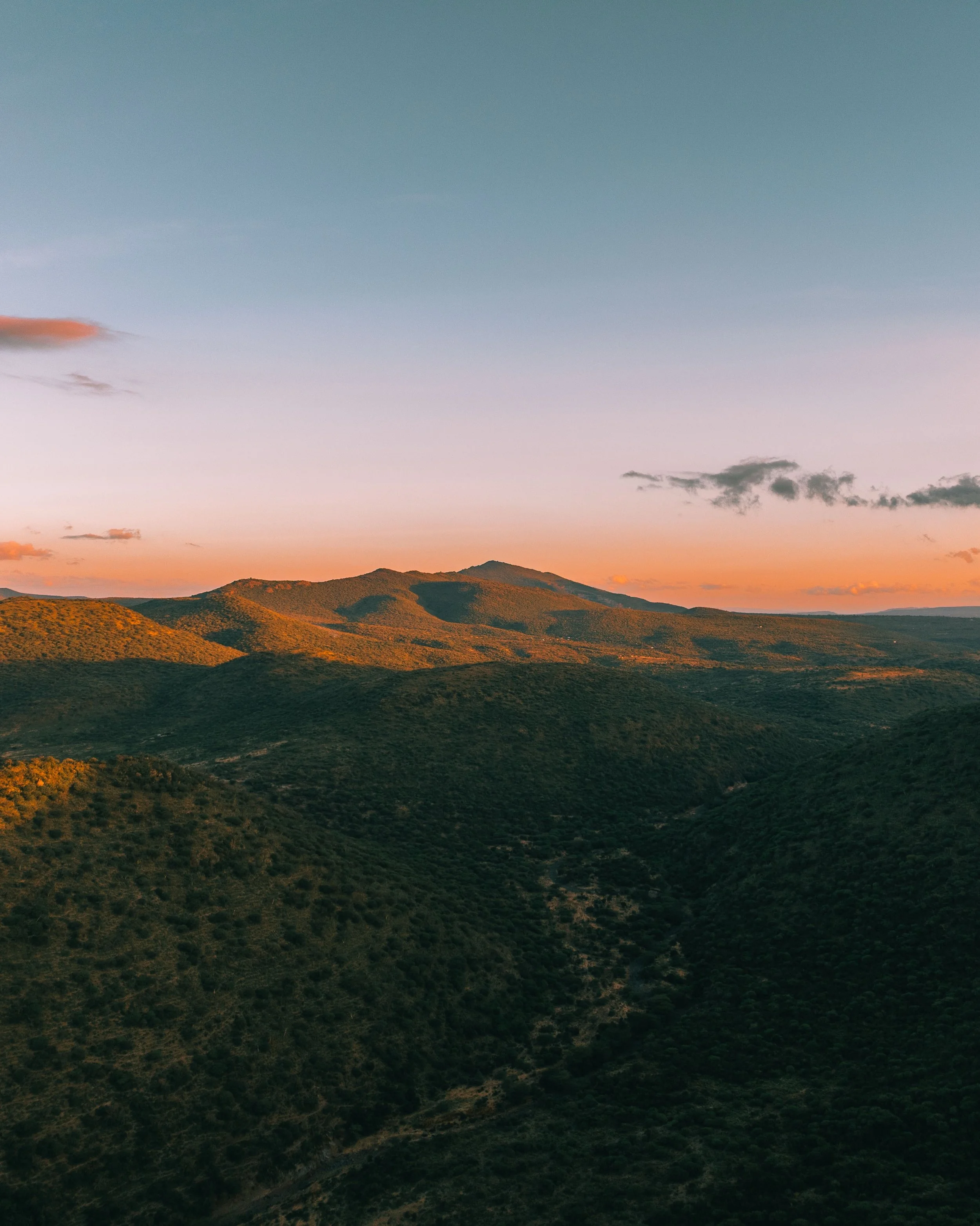 The way the last light sculpts these ridges in Kajiado is something else. When golden hour hits, the whole landscape transforms, revealing these deep, sweeping layers and shadows. There is a very specific, quiet kind of magic up here just before the 