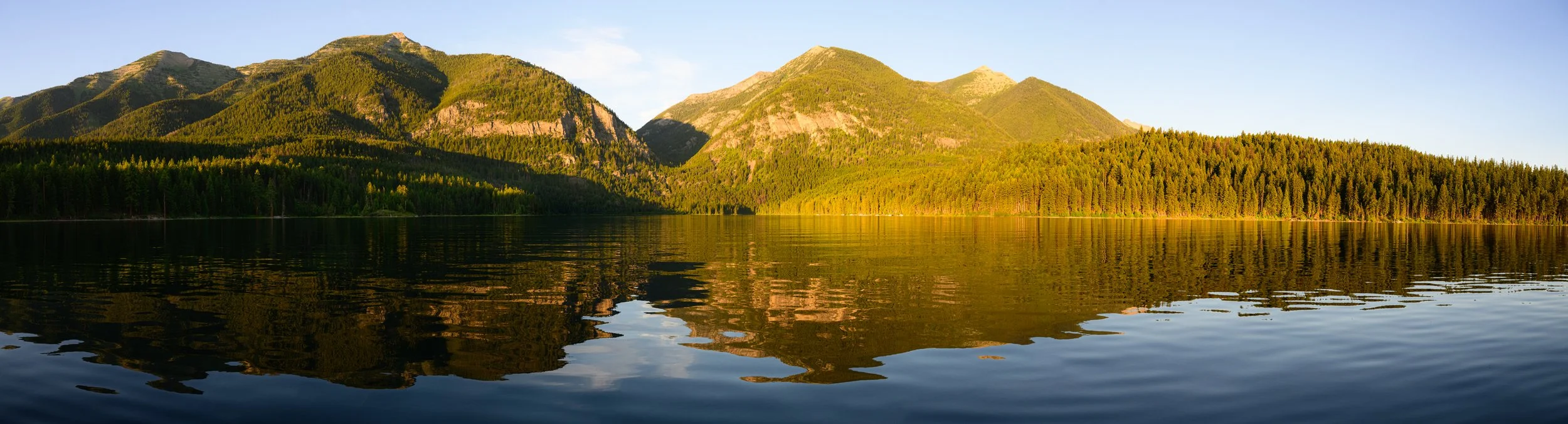 Pano of Holland Lake in Montana Glowing at Sunset