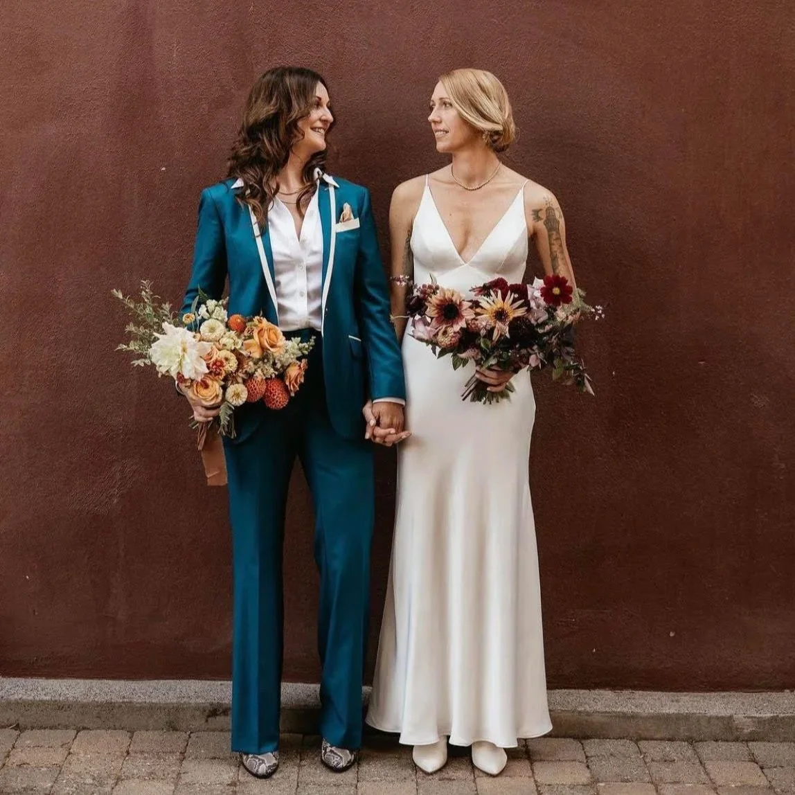 Featuring Deluxe, teal blue wedding suit with cream piping. A custom beauty!