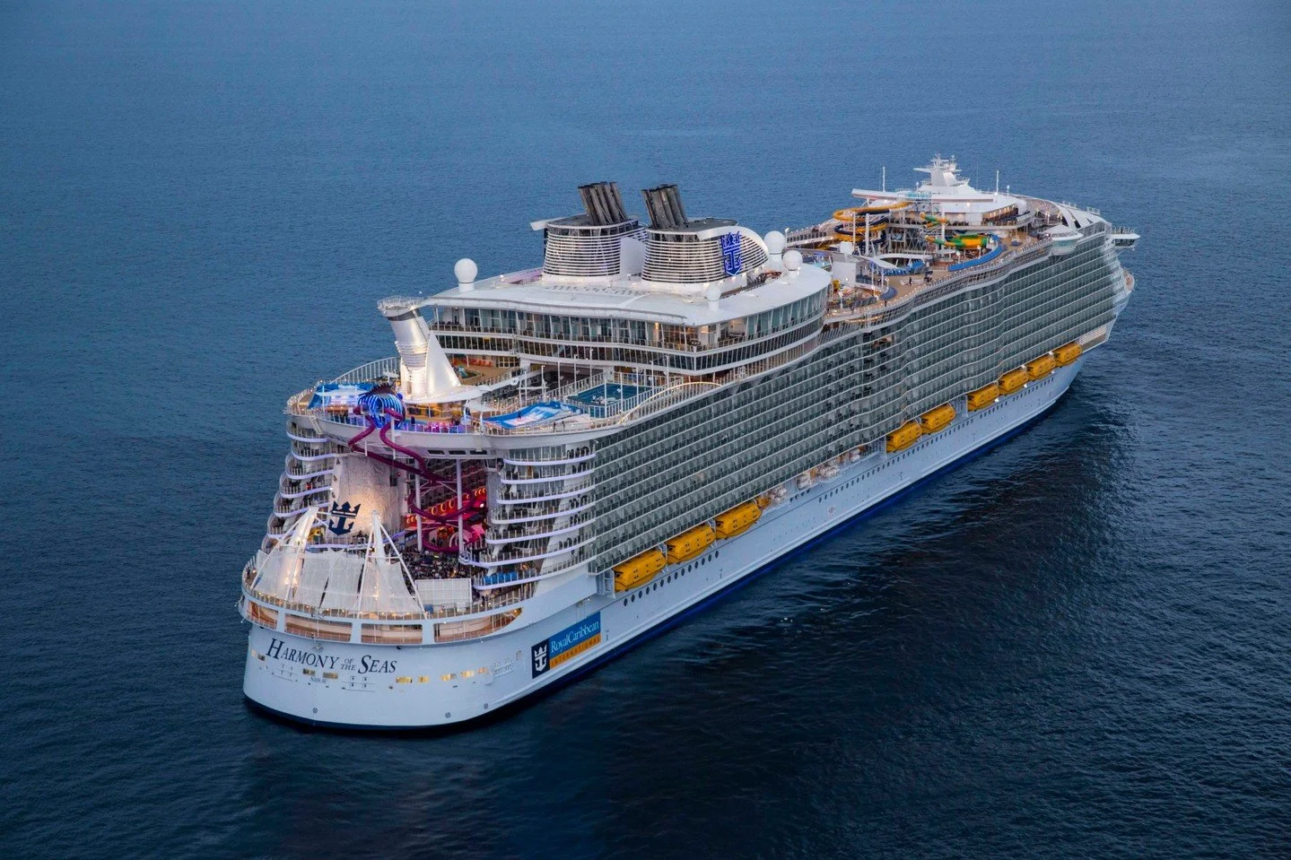 Experience the ultimate family fun onboard Harmony of the Seas! ✨ Dive into thrilling adventures, from the Ultimate Abyss slide to exhilarating AquaTheater shows. Contact me, (561) 247-4040, to create unforgettable memories with Royal Caribbean! #Roy