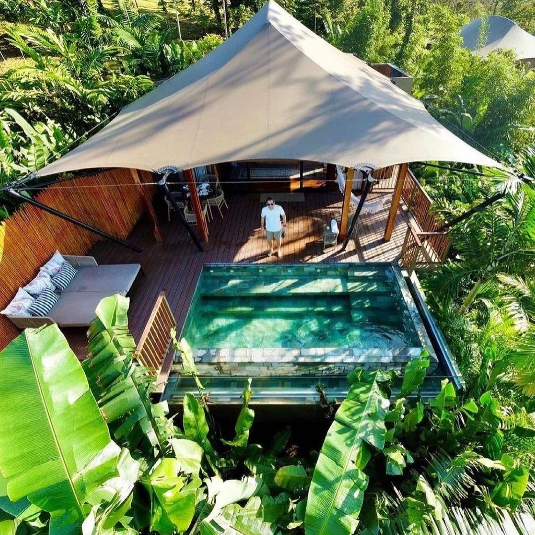 Reconnect with your sense of wonder with a treehouse getaway like no other. Discover breathtaking views and tranquil moments high above Central American forests.  #CentralAmerica #UniqueLodging #NatureLodging #TreehouseAdventures