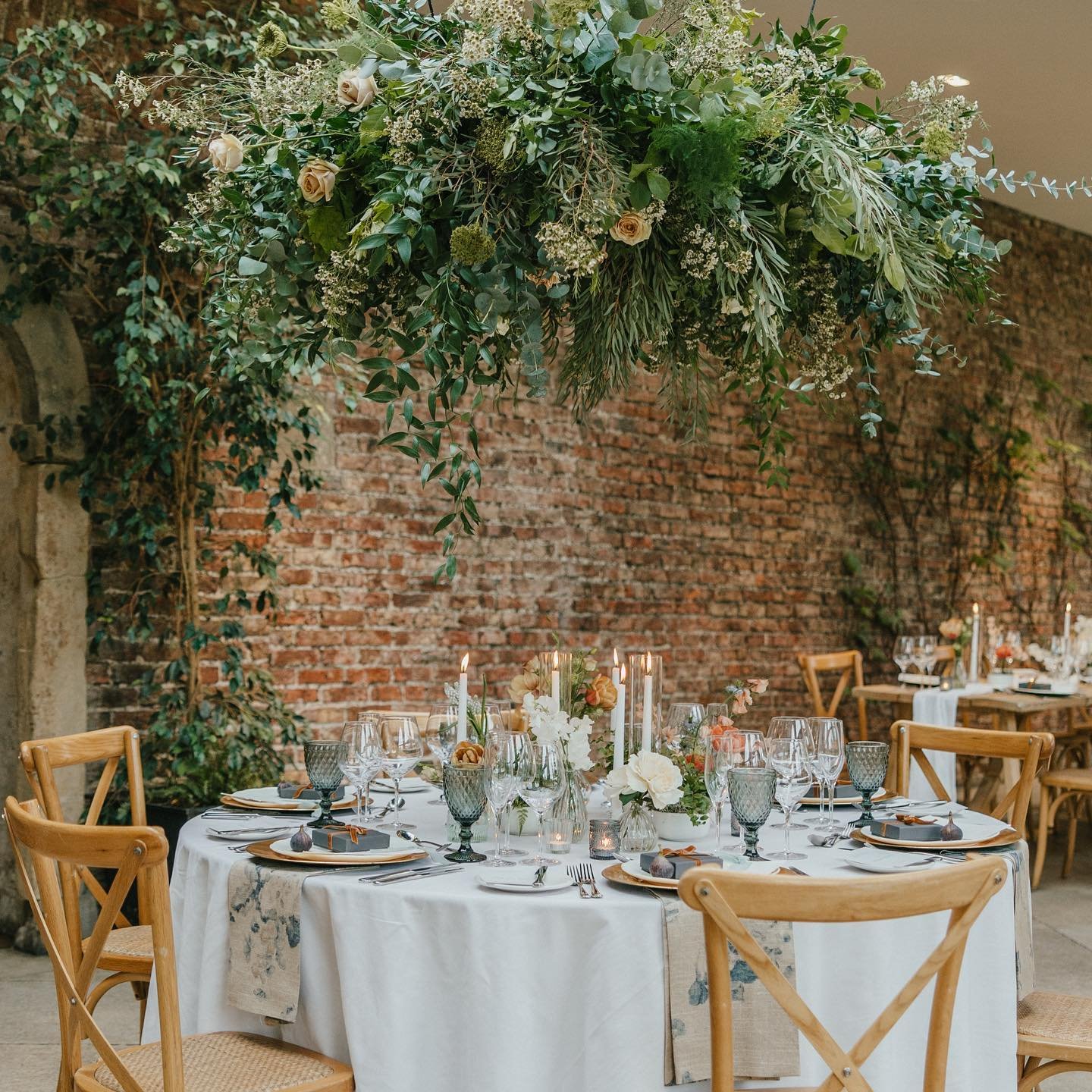 If you&rsquo;re wondering how to make a stunning visual statement, you can with a fabulous hanging installation.

We created this lush overhead canopy for a wedding breakfast using seven varieties of foliage, Ammi, Golden Mustard roses, white spray r