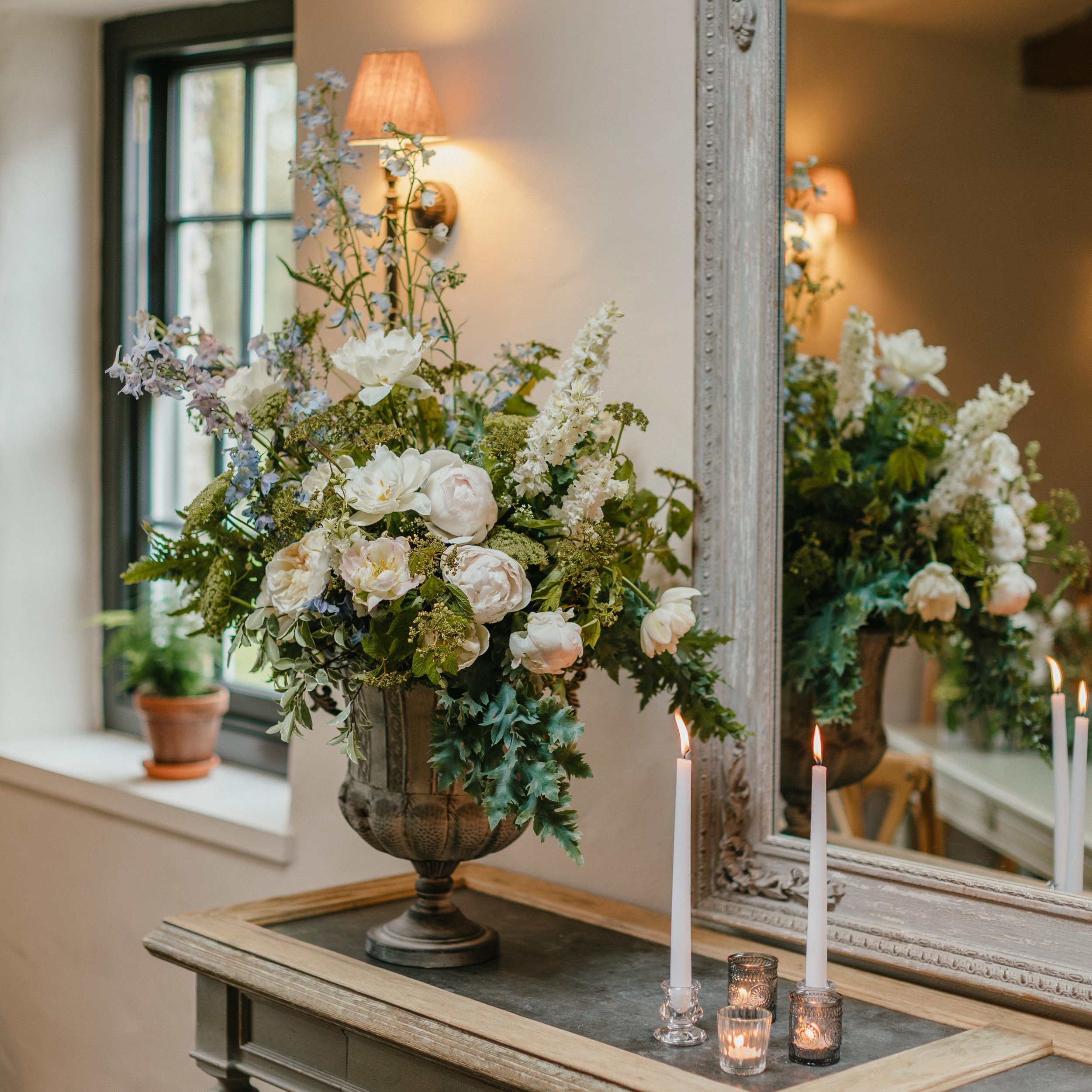 Urns are one of my favourite arrangements to design and create. 

So versatile for size, shape and positioning. They create a beautiful focal point individually, paired or grouped, and can be moved around your ceremony and wedding breakfast spaces. A