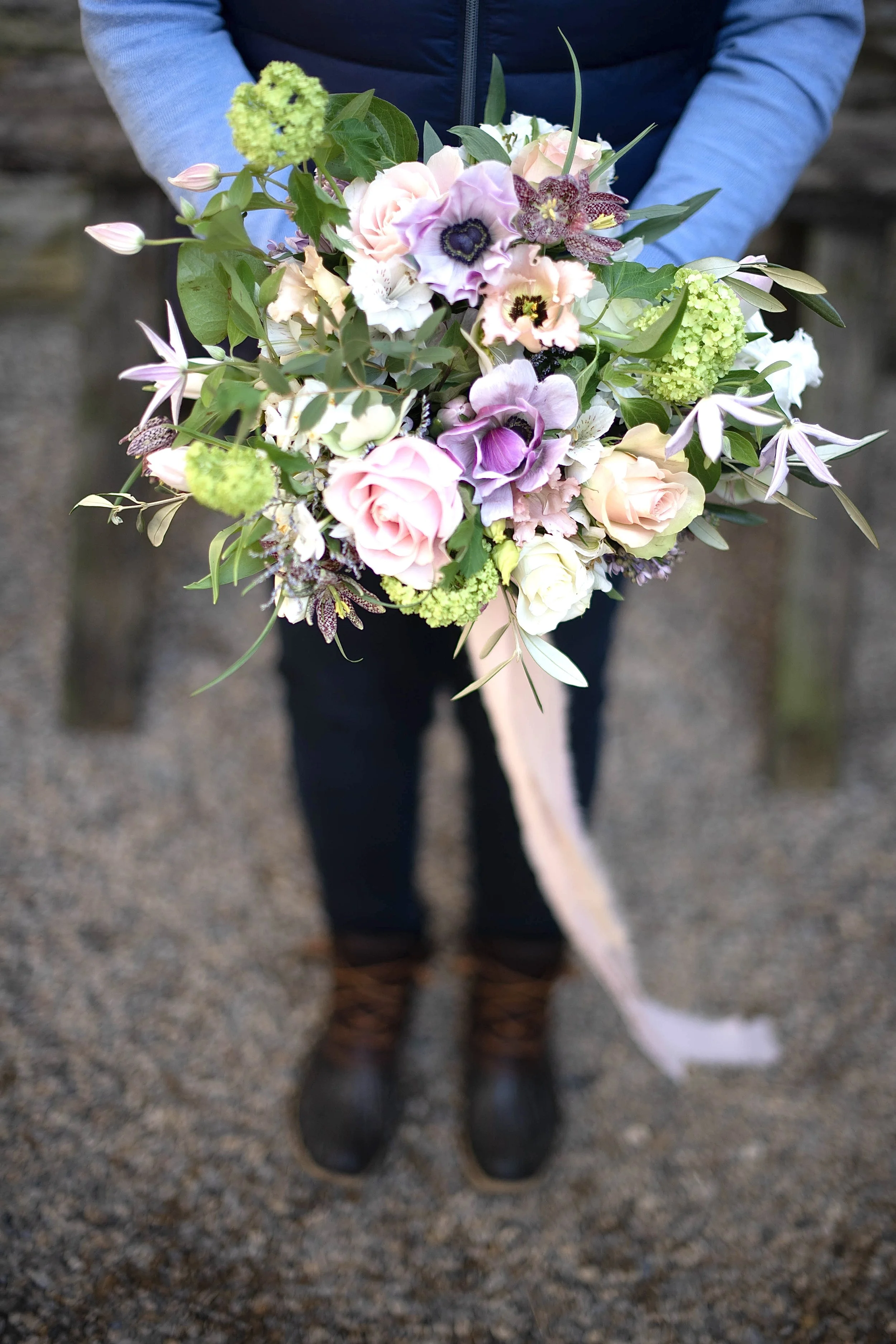 Purples and peach bridal bouquet