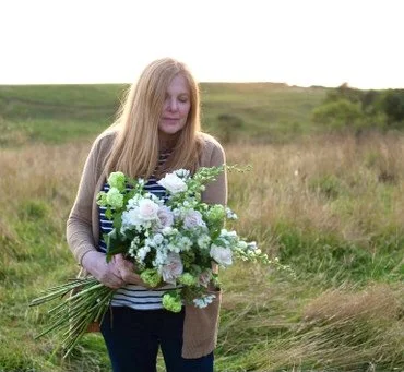 Me holding bridal flowers