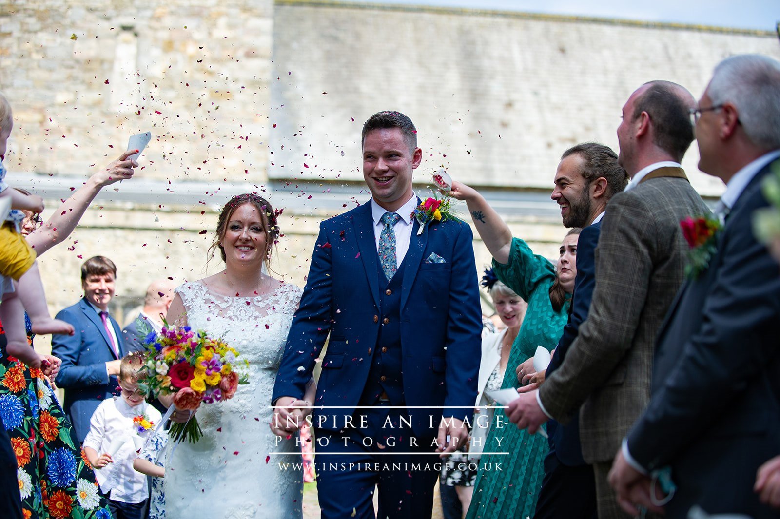 Bride and groom, confetti shot
