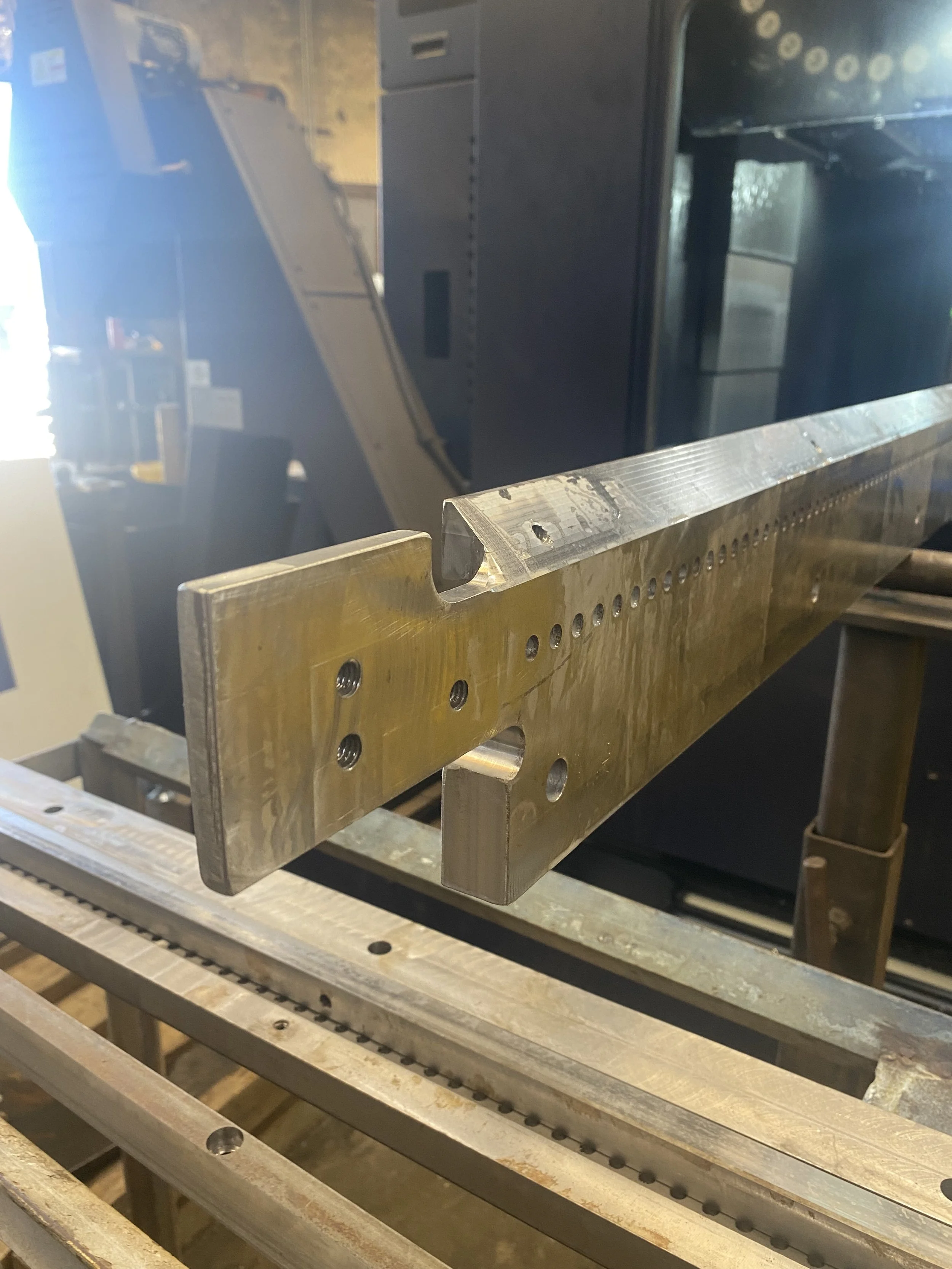 45° Taper on front edge to clear the saw blades