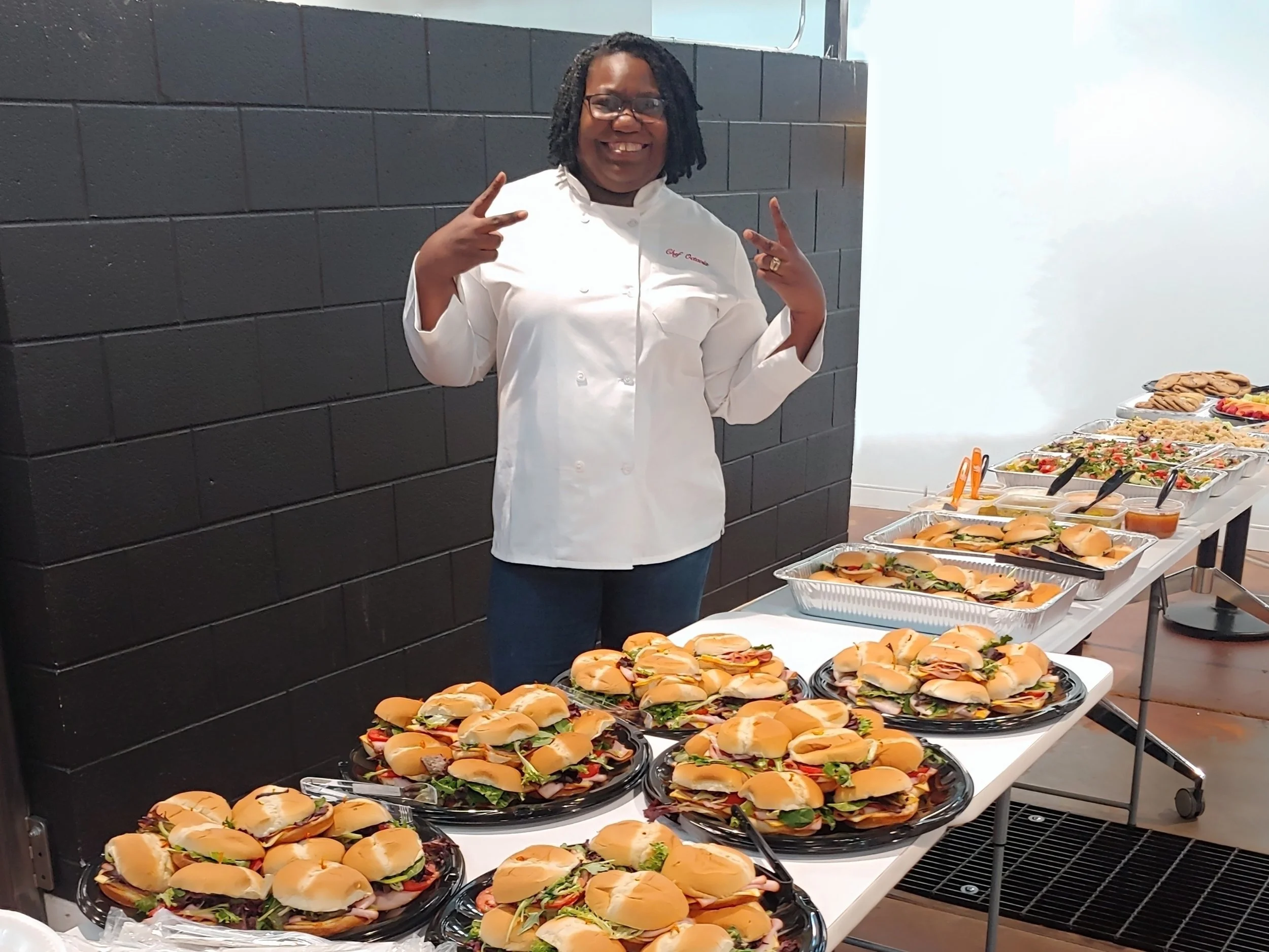 Chef Tay feeding the masses.jpg