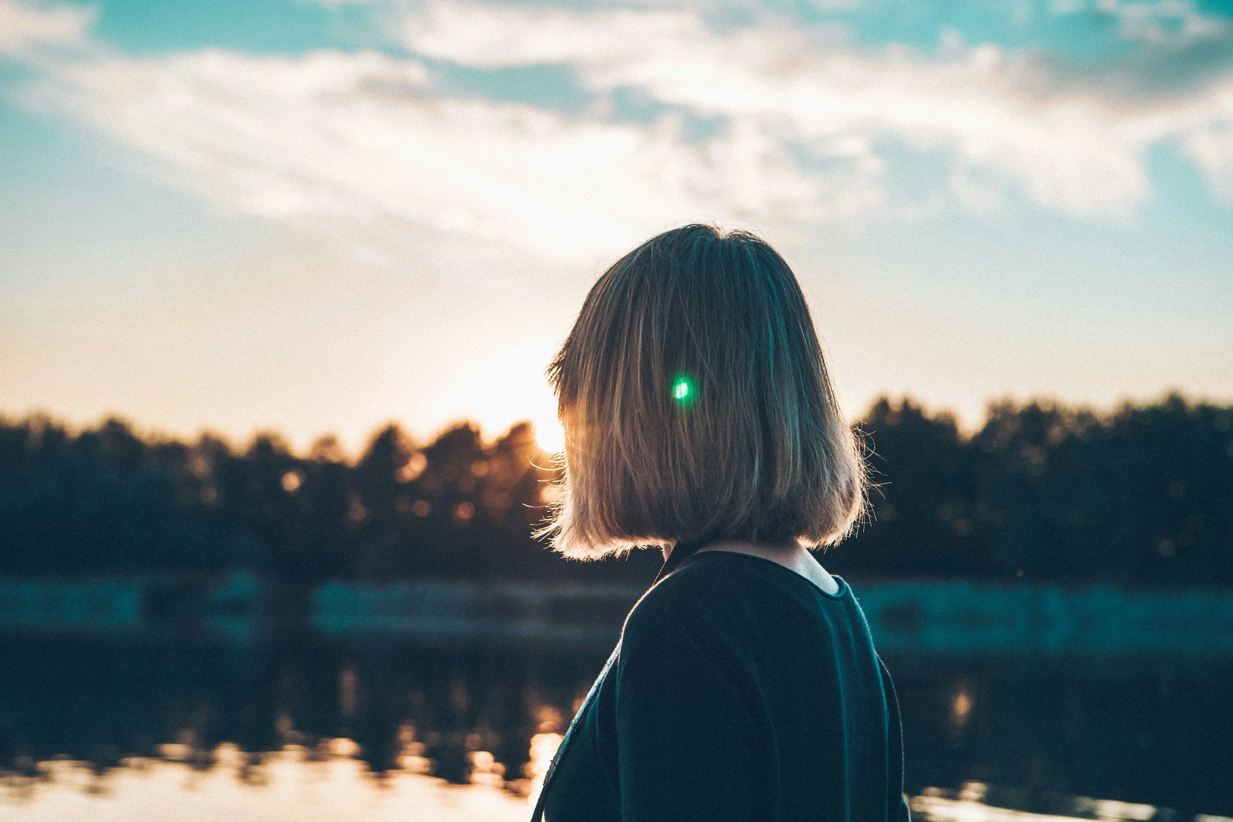 woman looking out at water