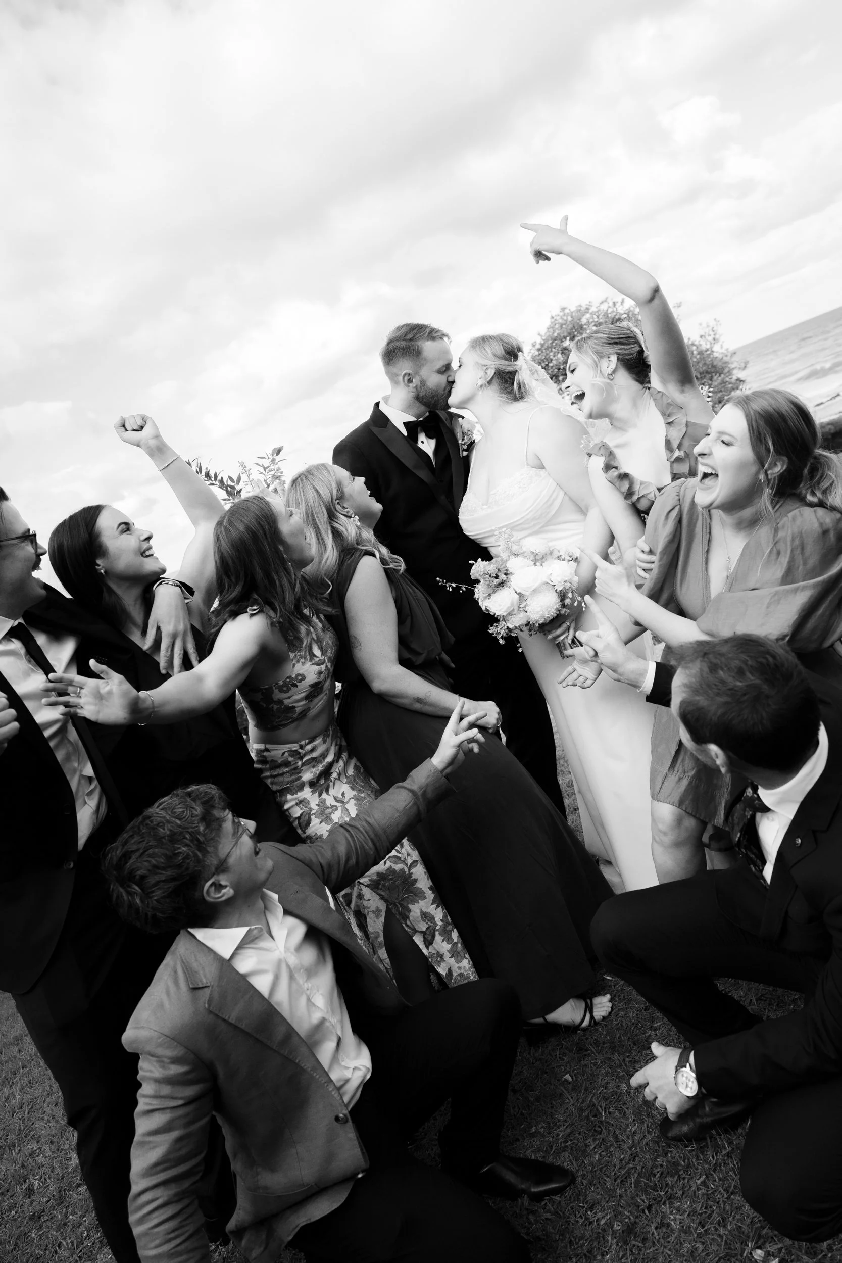 A black and white photo of a bride and groom at Wye Beach Hotel.