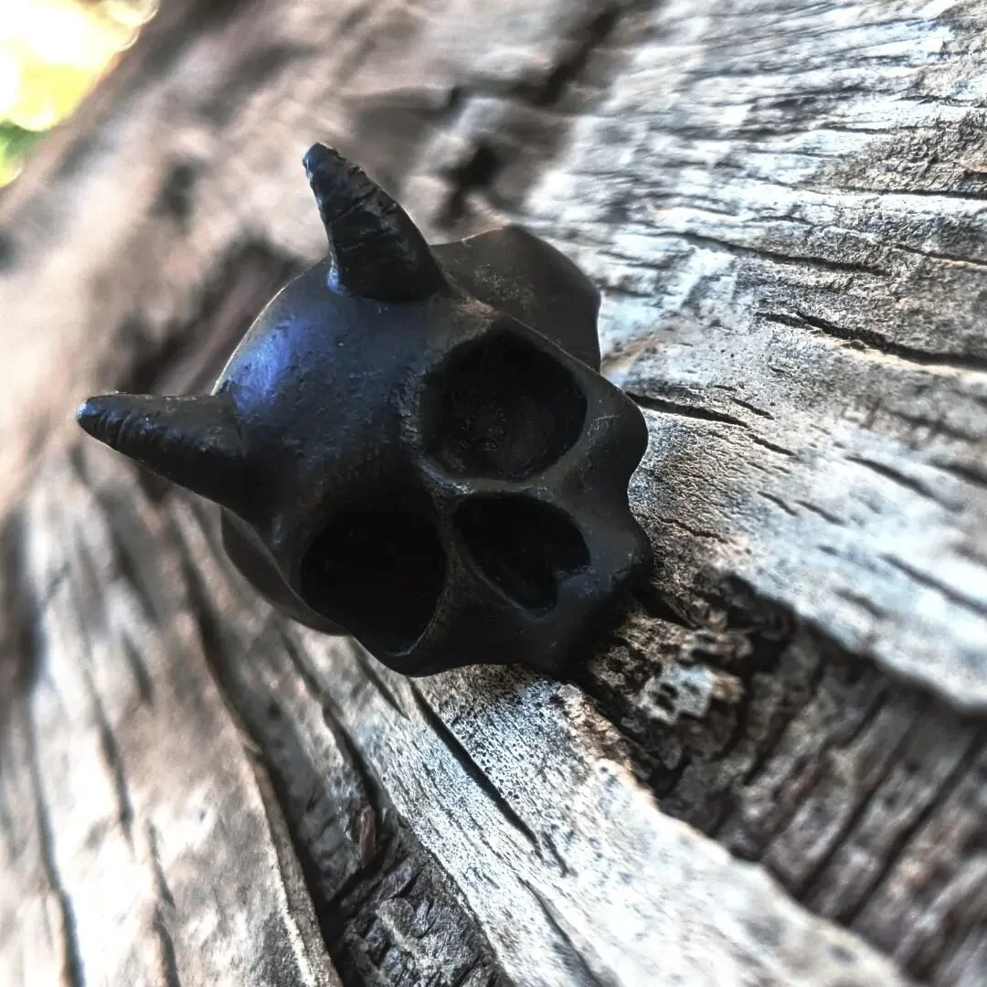 The pyre is built tall,
the flames reach into your soul, 
licking at the boundaries of terror, 
in an ancient crypt you smell earth and ash,
anointed with ink,
your salvation lies Grim,
in gold and silver

GrimMetals.com

#skull #skulljewelry #skullr