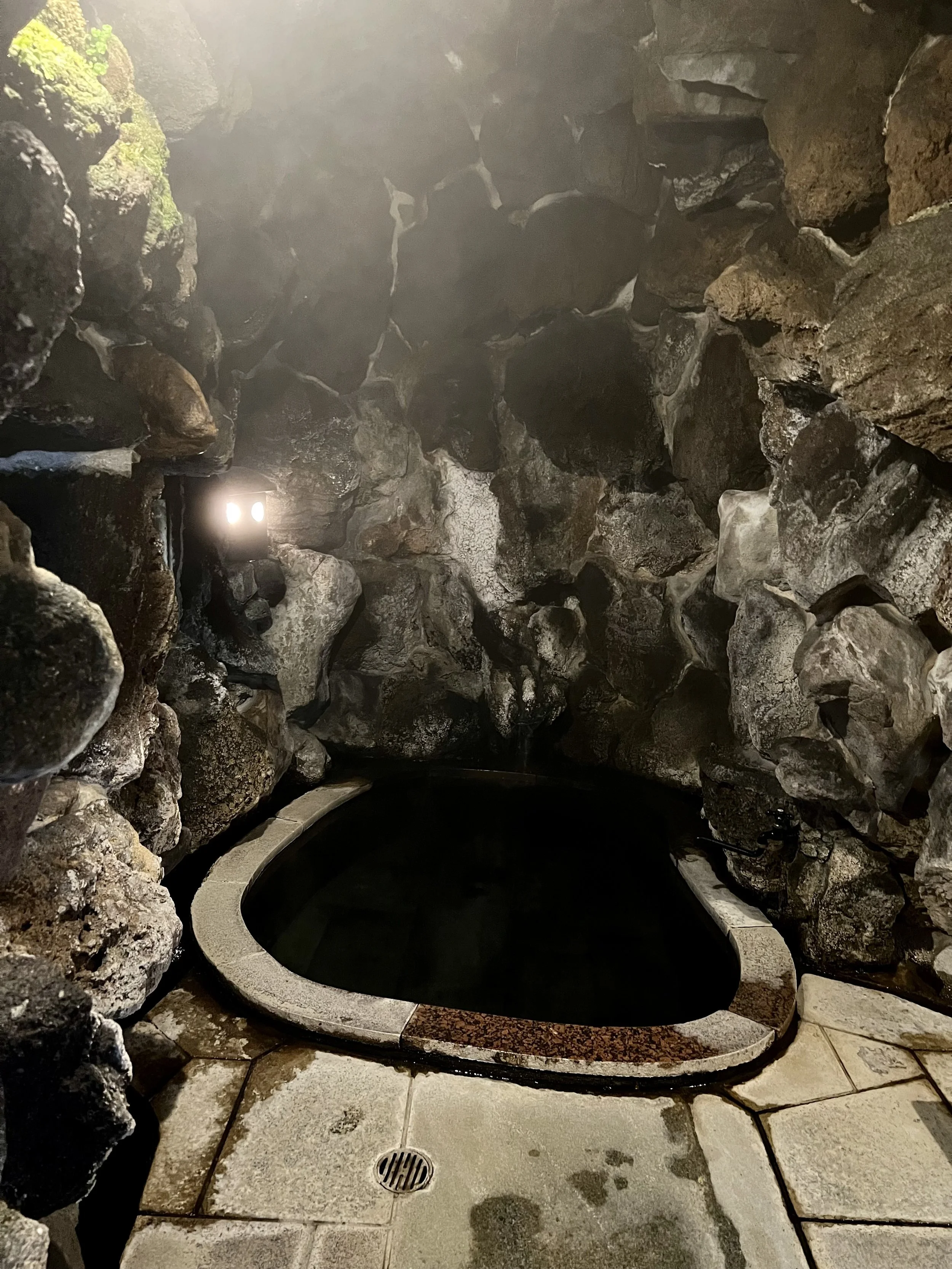 Beautiful small private onsen bath in a cave at Kanaguya ryokan in Shibu Onsen