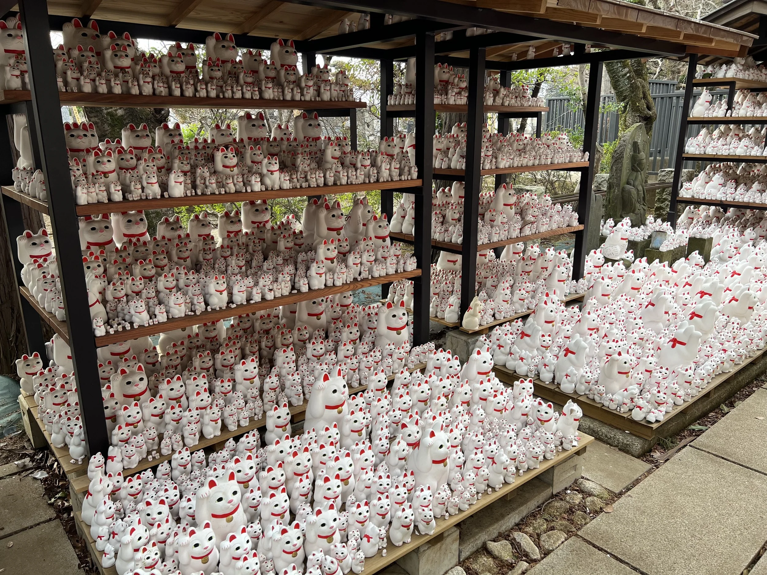 Hundreds of manekineko statues in Gotokuji temple in Tokyo
