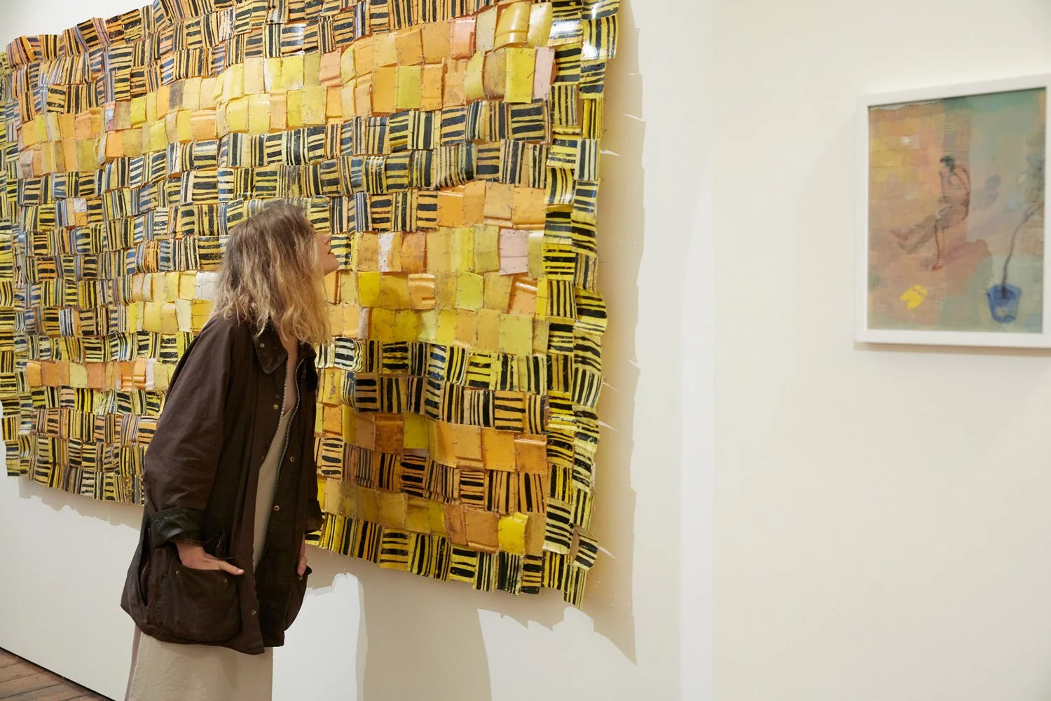 portrait of student Isabelle bending forward to look at an artwork on show at the Courtauld Institute in London