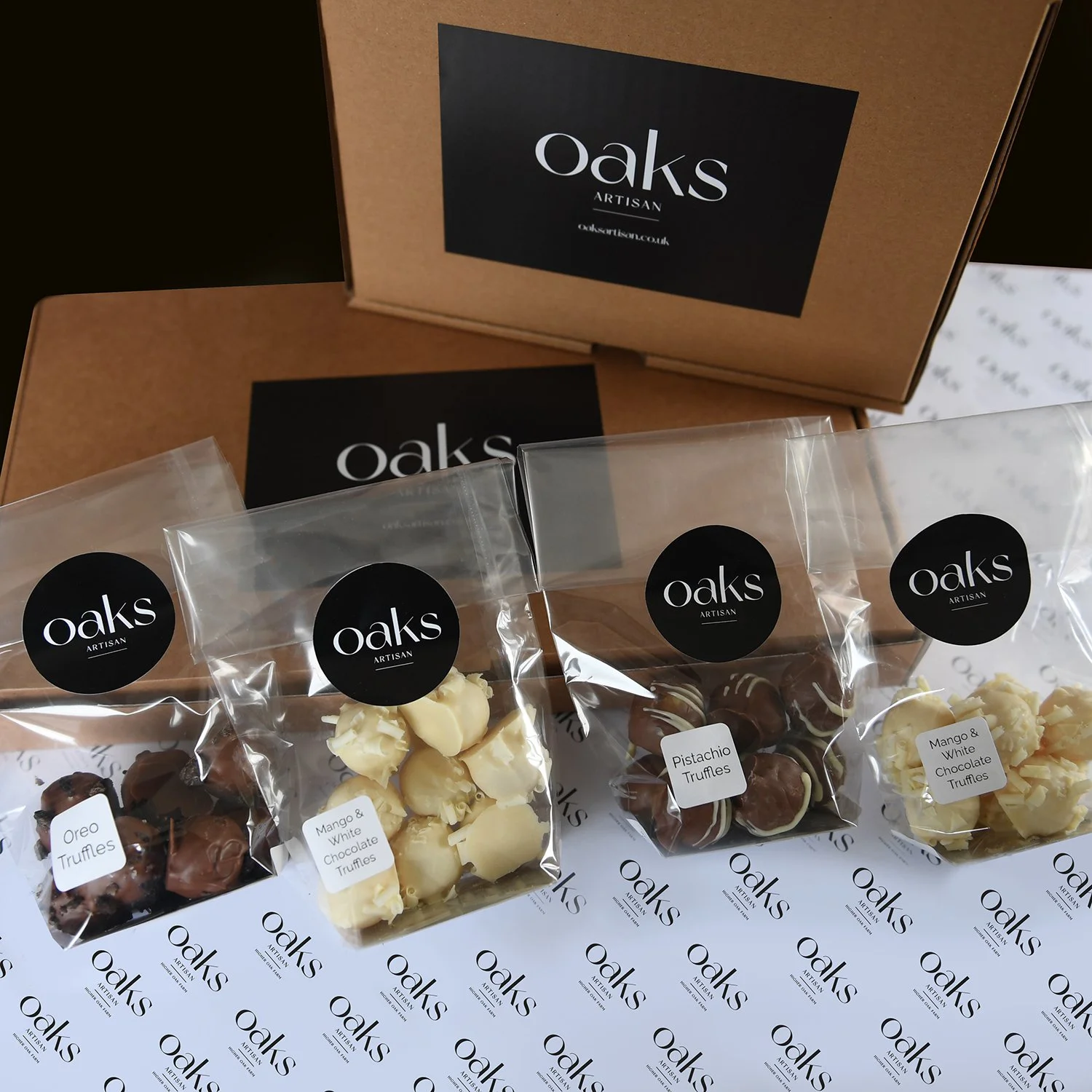 Handmade Chocolate Truffle Selection Box: A personalised box of 4 artisanal truffle flavours, including Milk Chocolate Raspberry, White Chocolate Pistachio, and more. perfect for gifting.