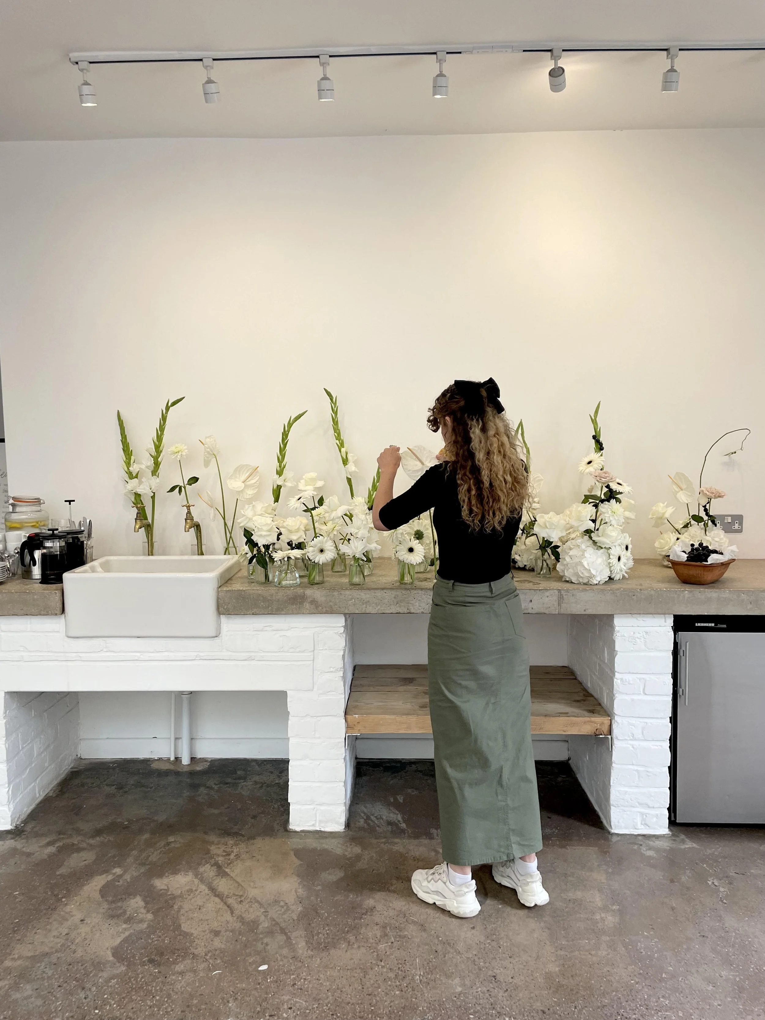 Florist making wedding flowers