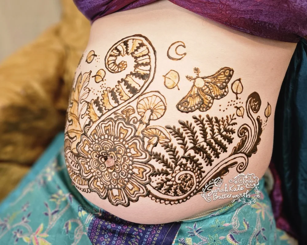 #hennaart #hennadesign #FeminineEnergy #MaternityArt #NatureInspired #MoonMagic #GoldenRatio #mushrooms #pregnancyhenna #hennabelly #boulderhenna #hennapaste #blessthemama #sacred #ferns