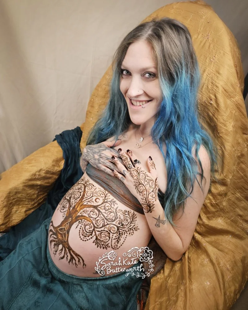 #NordicMythology #VikingSymbolism #HennaArt #PregnancyHenna #MotherhoodMagic #TreeOfLife #SacredSymbols #MaternalLove  #HennaStorytelling #bellyhenna #coloradohenna #pregnancyart