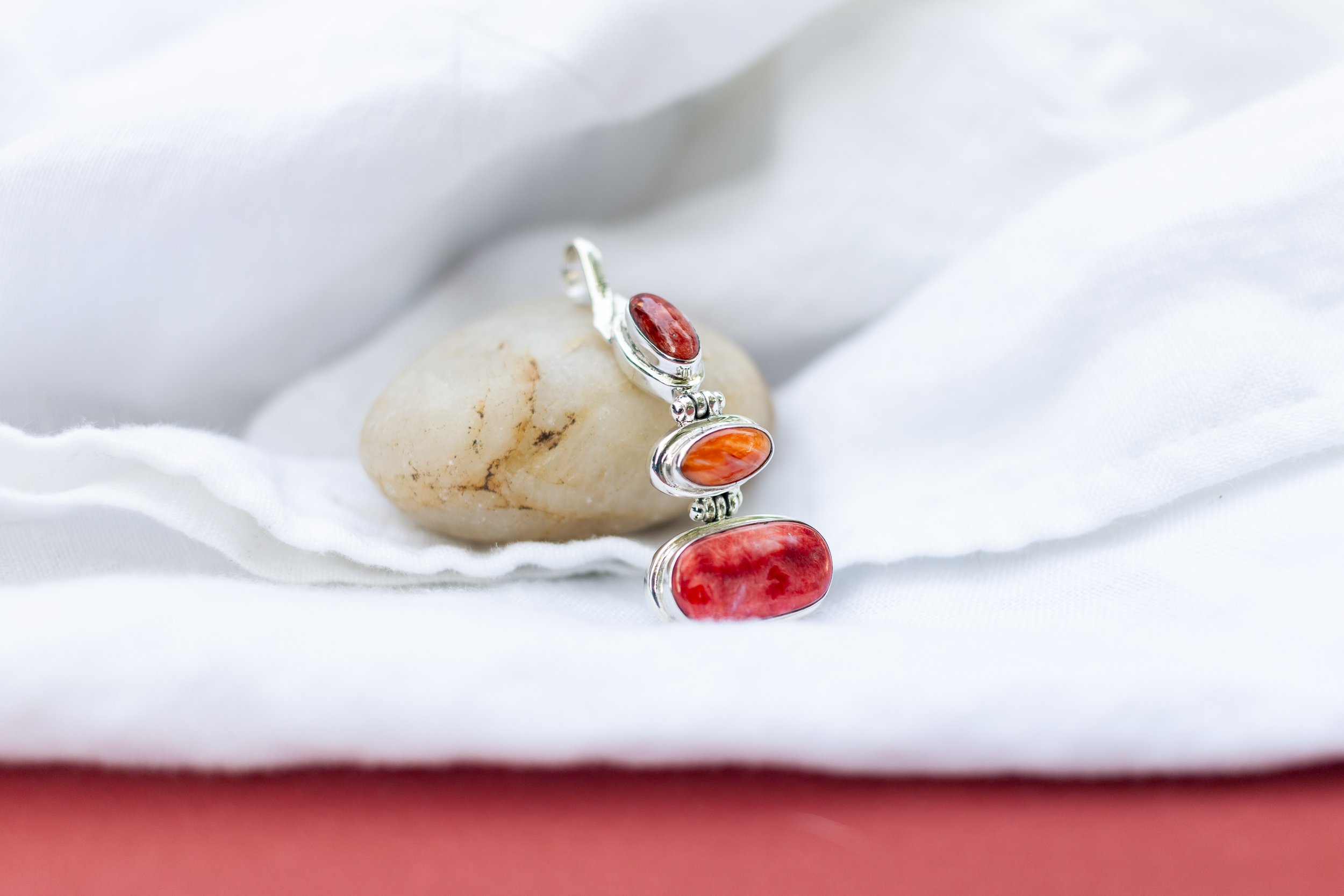 Dangling coral pendant 2.jpeg