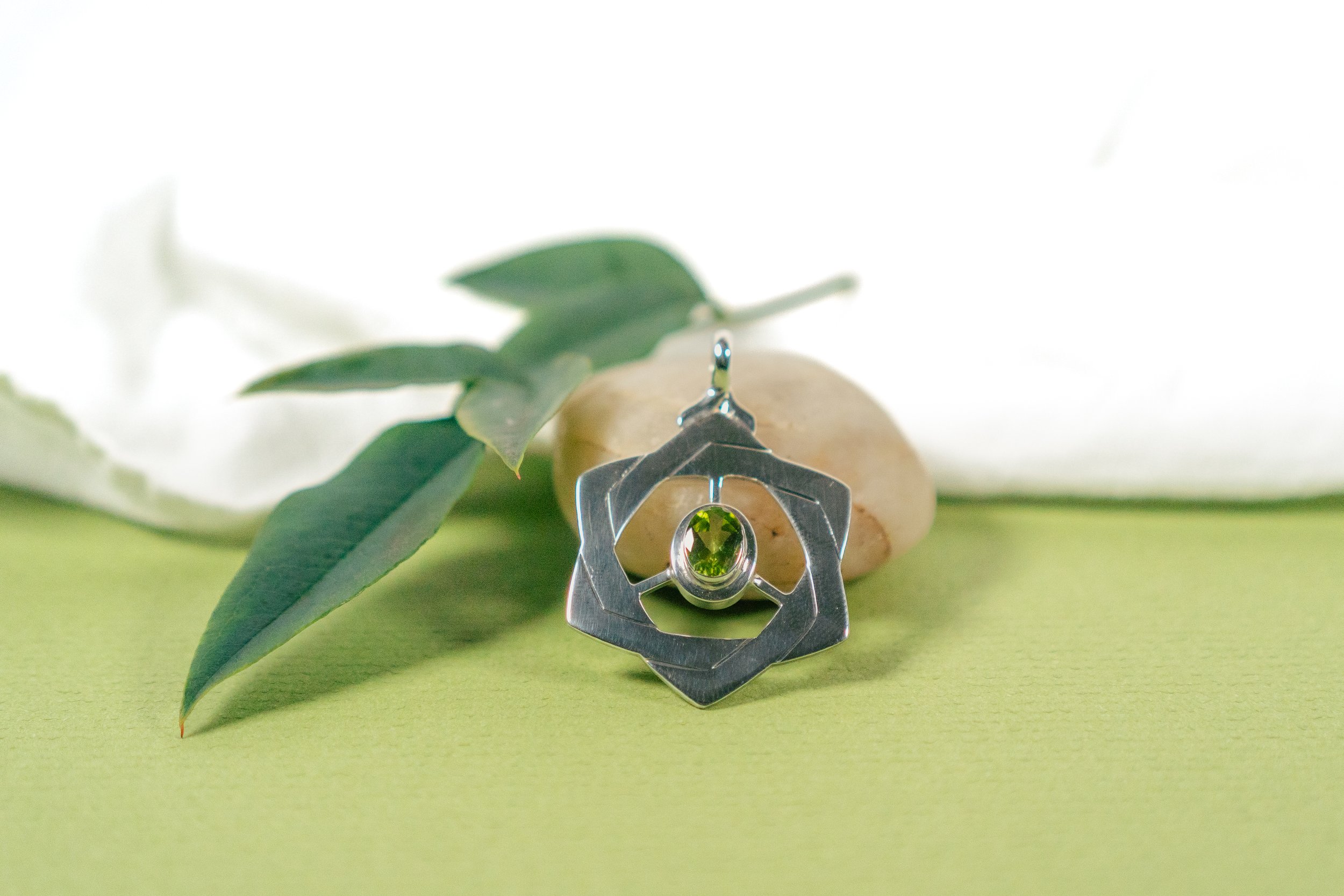 Peridot Tetrahedron on Rock.jpeg