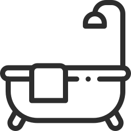 Silhouette of a bathtub with a showerhead and a small faucet