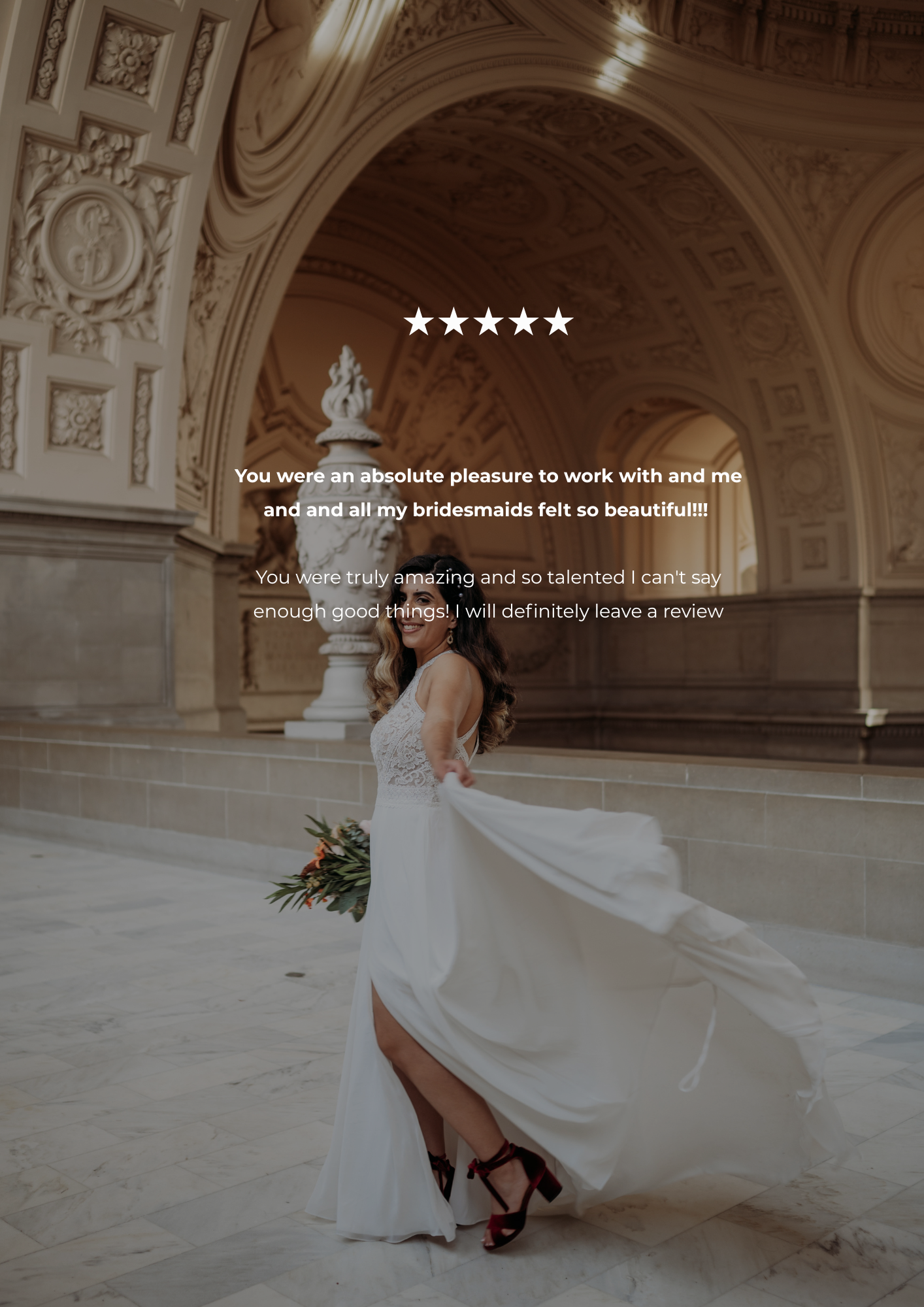 Bride in a flowing white wedding dress with a bouquet, posing in an ornate architectural setting.