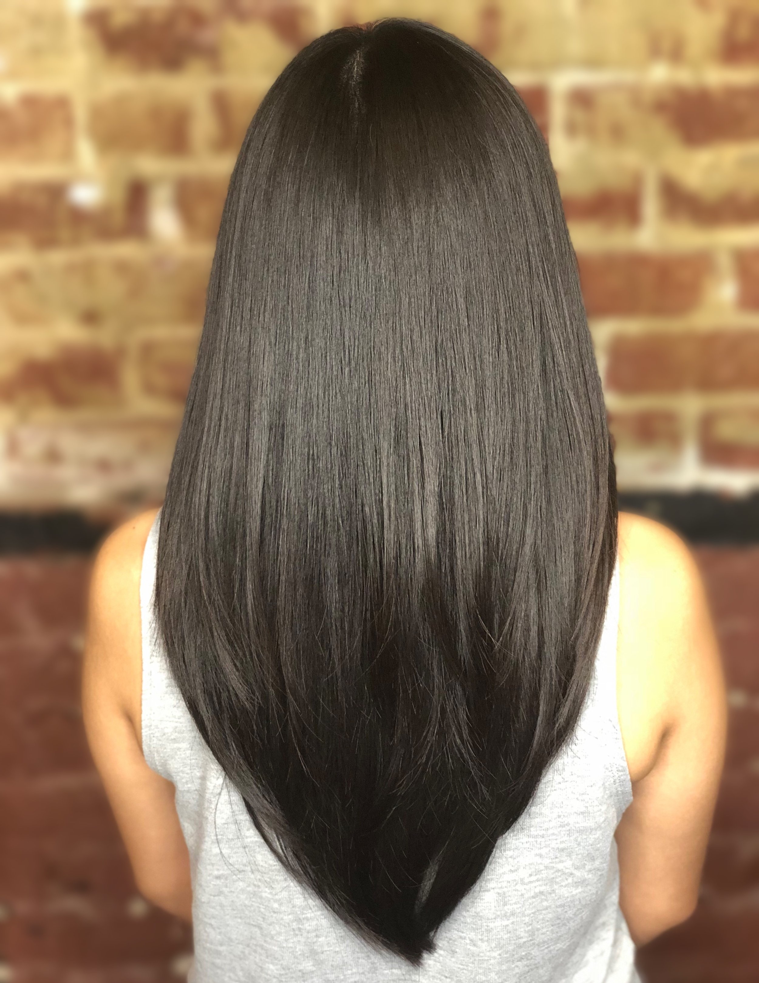 Woman with long straight black hair