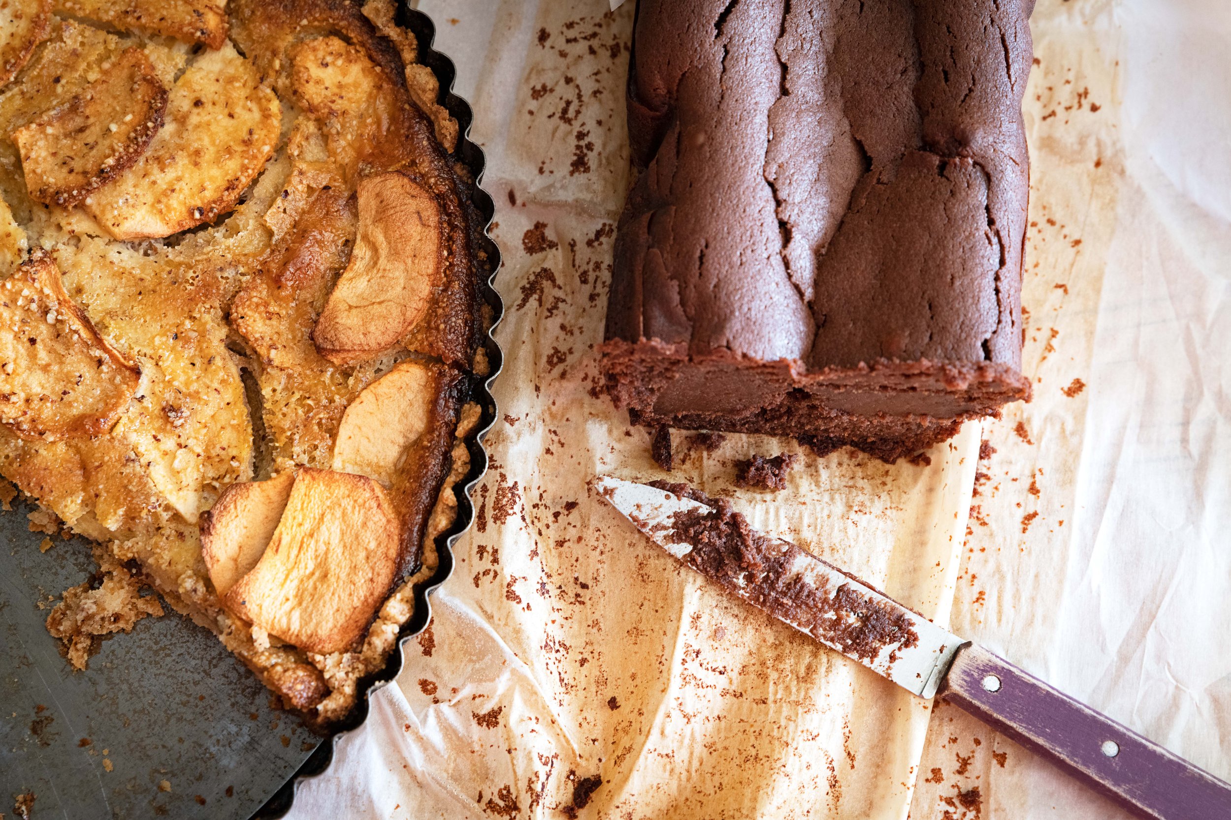apple pie and chocolate cake in the kitchen