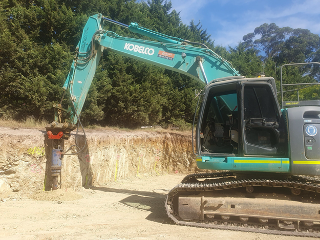 Auger holes for retaining walls