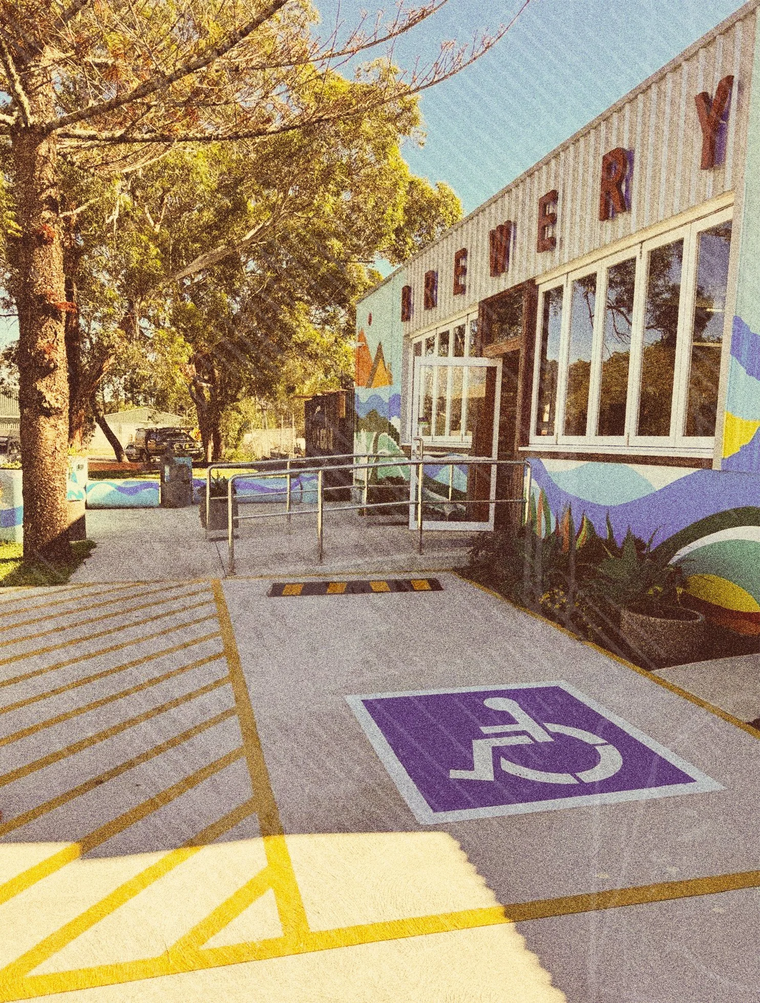 Disable parking spot next to the ramp to the entry door