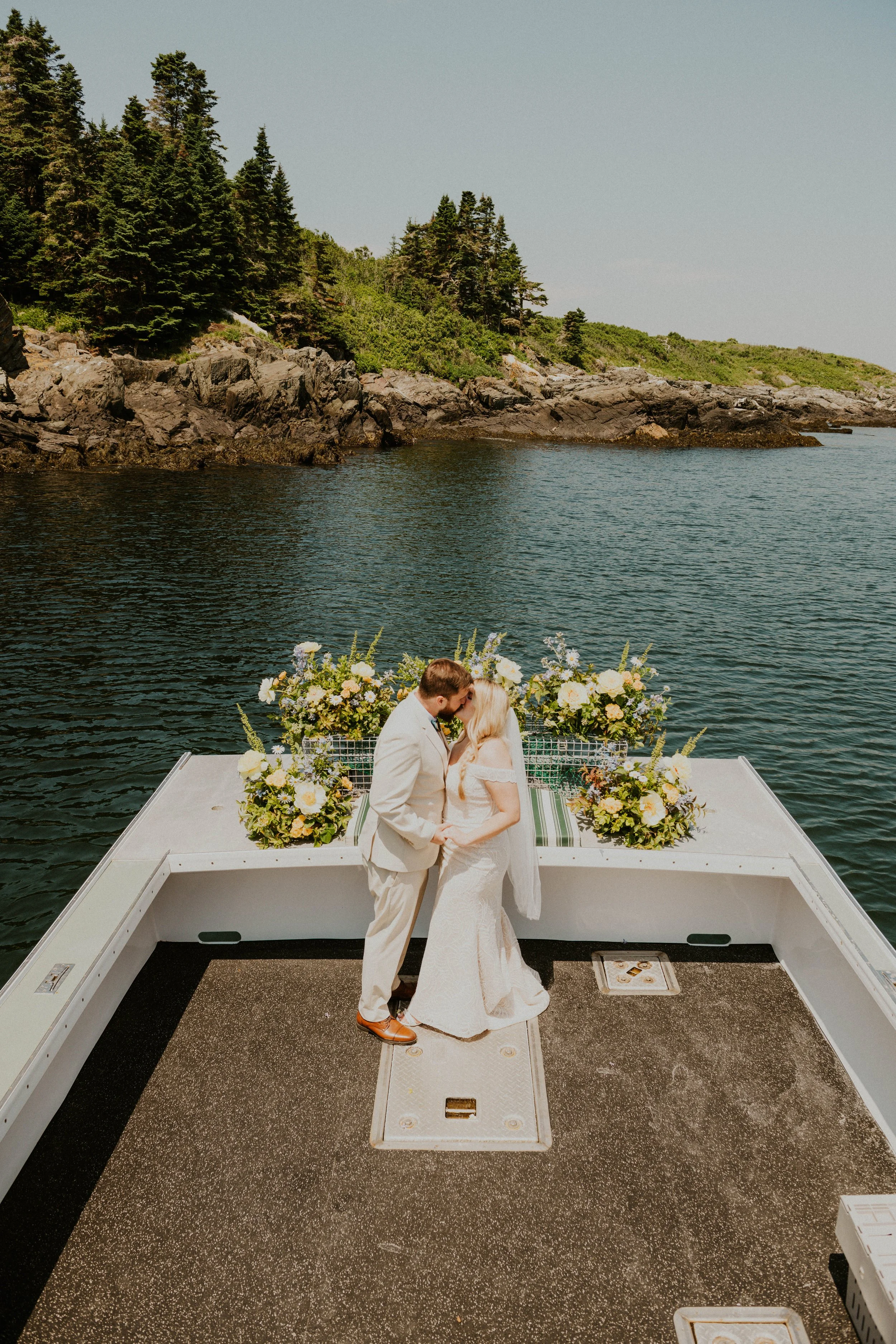 Portrait of married couple in Seguin Cove on boat