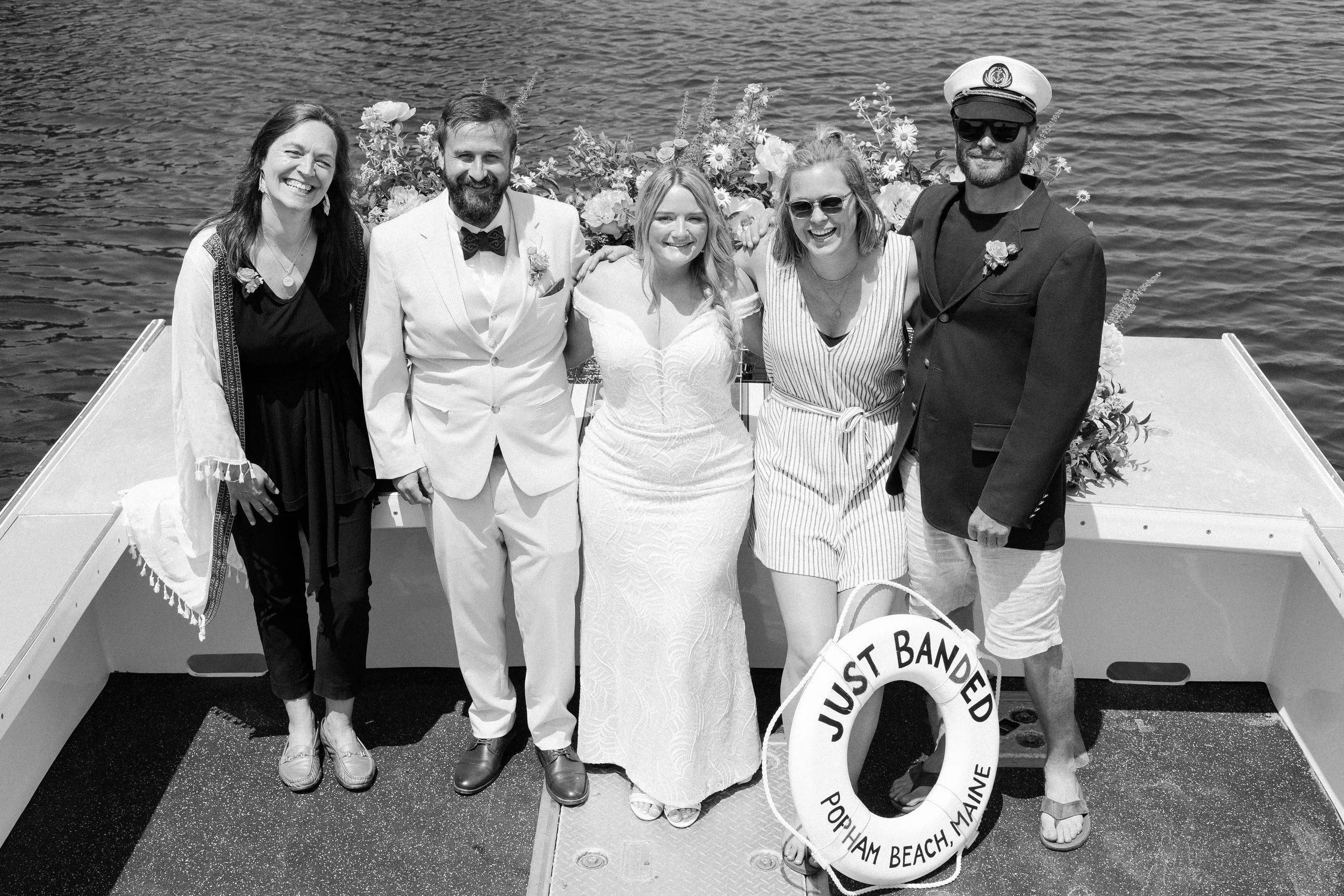 Just Banded elopement crew with bride and groom
